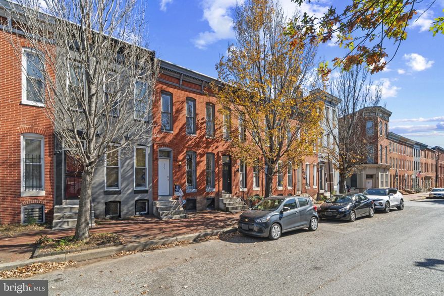 Welcome to a classic white marble steps Baltimore Row house.  It is an excellent value for a 3 bedroom townhome in the  Ridgely's Delight historic district. It is a great charming neighborhood convenient to everything.  Walk to Camden Station and both stadiums.  Great for DC commuters via the train. Just short walks take you to the Inner Harbor, University of MD and hospital and the downtown business district.  It is also just off I-95. It is on a no through street with no homes on the opposite side of the street. This provides exceptional on street parking. The home is in VG condition. Just move right in.  It has newer appliances, some new flooring and some other updates.  It has an unusually deep fenced back yard which backs up to a large open space. Enjoy the peaceful view from the deck.