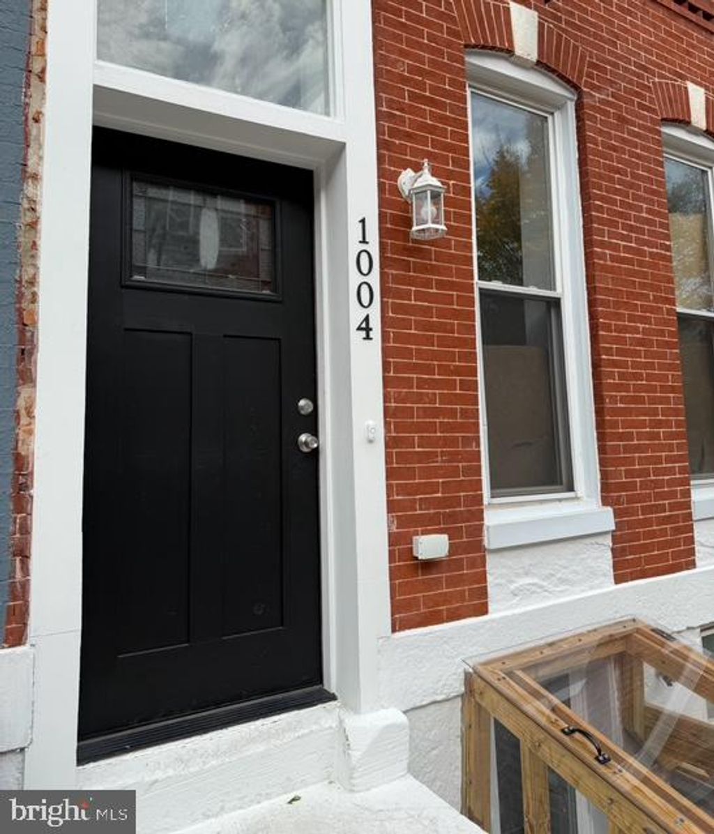 Photo of 1004 Bennett Place, BALTIMORE, MD 21223 (MLS # MDBA2189422)