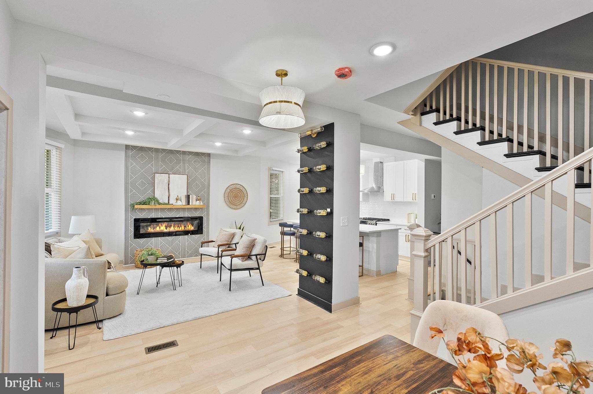 Welcome to 3708 Fairview Ave in Forest Park! This luxurious 6-bedroom, 5-bathroom home spans across 4 levels, offering the epitome of elegance and comfort and features a Separate entrance unit with full kitchen & bath that can be used for potential rental income, Air BNB or in-laws Suite. Step inside and be captivated by the open-floor concept, boasting 9-ft trey ceilings, Living room, Dining room, Family Room, recessed lights, accent wall and a stunning Custom Wine Wall. The heart of this home is the chef's kitchen, featuring top-of-the-line appliances including a Samsung Smart Refrigerator with 21.5" Touch-Screen & apps, a large island with quartz countertops, a 5-burner stove with a custom hood range, a custom backsplash, and 42" soft-close cabinets. This space is perfect for culinary enthusiasts and entertaining guests. This remarkable home offers not one, not two, but three primary suites with one on the 1st level & two on the second floor. The main master suite is a true retreat, complete with a standalone soaking tub, a spa shower, dual vanity, his and her walk-in closets, a sitting area, and custom fireplace wall. The second master suite features a spa shower with, a dual vanity, and his and her closets. The fully finished basement with walk-out access includes a dry bar, large entertainment space, bathroom & tons of storage. The potential rental unit feature a separate lower front entrance and has a full kitchen, full bathroom, separate water heater and separate heating/cooling. Delight in the home’s exterior which includes a fully enclosed front & back yard w/ white vinyl fencing, fresh multi-car parking pad, new concreate walkway and extra-large deck all on a lot that provides plenty of space for family gatherings and entertaining. This home has been meticulously updated with a New Roof, 3-Zone HVAC, 200 Amp Electric, Gas, Plumbing work + Use & Occupancy Permit, ensuring worry-free living. Conveniently located, this home is just 1 mile from Forest Park Golf Course, 3 miles from 3 separate major shopping malls in either direction with popular restaurants, 2.5 miles from the Baltimore Zoo and the expansive Druid Hill Park, 3 miles from Pimlico race Course where Preakness is held, 5 miles from Penn Train Station, and about 6 miles from the Baltimore Ravens & Orioles Stadiums. It’s also within walking distance of Lake Ashburton & Druid Hill Park, which offers numerous amenities, including playgrounds, tennis courts, ball fields, a frisbee golf course, a pool, basketball courts, greenhouses, picnic areas, the Howard Peter Rawlings Conservatory and Botanic Gardens, a Zen Garden, an urban greenway park, the Jones Falls Trail, City Farms Garden, Safety City, and the Lakeside Loop Trail around Druid Reservoir. The home provides easy access to major highways, I-695, I-70, I-83, and I-95. Don’t miss out on making 3708 Fairview Ave your new home, where luxury living meets affordability. Schedule a showing today and experience the true essence of refined living!