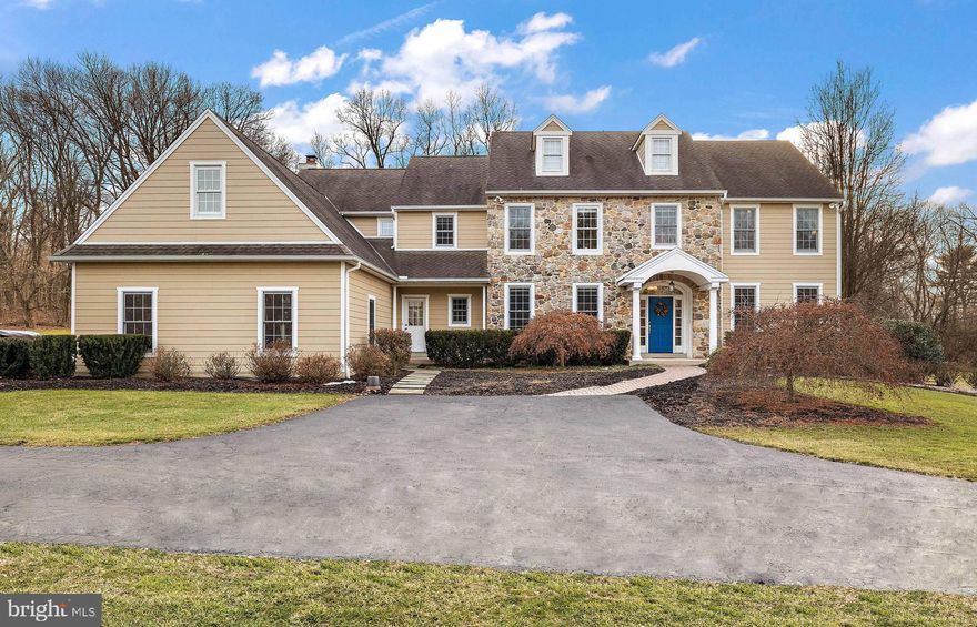 Welcome to 6 Houndstooth Lane! This 4 bedroom, 4.5 bathroom home is nestled within the serenity of 2 acres of meticulously landscaped grounds  in the heart of Chester County. This property is conveniently located near Lancaster, the Main Line, Philadelphia, and within the highly sought-after Owen J. Roberts School District. This exquisite property boasts unparalleled amenities, including a heated saltwater pool and built-in hot tub. Crafted with timeless elegance, this custom built Colonial-style residence spans 4,100 square feet across the first and second floors, with an additional 1,100 square feet of finished basement space. Throughout the main level, soaring 9-foot ceilings complement the refinished hardwood floors, evoking a sense of grandeur and warmth. Upon entry, guests are welcomed into a grand foyer extending from front to back, adorned with atrium doors that lead to an expansive brand new 1200 sq ft, pressure treated rear deck. The dining room exudes sophistication with raised panel wainscoting and triple crown molding, while a convenient Butler's Pantry offers ample cabinetry and elegant ceramic tile flooring. The gourmet kitchen is a chef's delight, featuring Maple and Cherry Shaker style cabinetry, stainless steel appliances, including a double oven and gas cooktop, and a spacious center island with a built-in sink. A cathedral ceiling graces the breakfast room, creating an inviting atmosphere, with an atrium door leading to the patio. The Great Room captivates with a River Stone raised wood-burning fireplace (that can easily be converted to gas if preferred) and a dramatic cathedral wall of windows, seamlessly connecting to the kitchen through an arched passageway. Additionally, a sitting room with double pocket doors offers versatility as a potential fifth bedroom or guest suite, and leads to a sunroom with an abundance of natural light. The main level also features a powder room and access to the spacious, 3-car attached garage. Continue your tour upstairs via the extra-wide main staircase which leads to the luxurious Master Bedroom retreat, complete with a tray ceiling, dual walk-in closets, and a spa-like ensuite bathroom featuring dual Cherry vanities, an oversized Jacuzzi, and a large shower stall. Three additional bedrooms, including a princess suite and a Jack & Jill bathroom arrangement, provide ample space for family and guests. The lower level offers endless entertainment possibilities, featuring an additional living area, potential for a gaming room, and a walk-up exit to the garage. Add an additional bathroom to the basement with ease with the rough in plumbing already existing. There is an unfinished bonus room above the garage that can easily be turned into a recreation room, additional bedroom, or large home office. With meticulous attention to detail and an array of luxurious amenities, this distinguished residence offers the epitome of refined living and endless opportunities. Schedule your showing today!