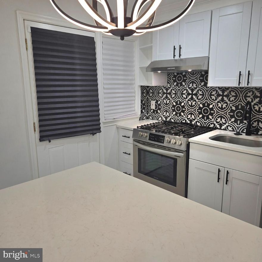 PROPERTY IS ALARMED! Seller strongly encourages Kensington Realty Title LLC to close deal.
Nestled in a charming neighborhood, this exquisite Colonial townhouse, built in 1951, seamlessly blends classic elegance with modern comforts. With three spacious bedrooms and two full bathrooms, this home is a sanctuary of warmth and sophistication, perfect for those who appreciate the finer things in life. As you step inside, you are greeted by an inviting atmosphere that exudes character and charm. The interior boasts a fully finished basement, New Roof, New Windows, providing ample space for entertainment or relaxation, with both interior access and an outside entrance for convenience. The heart of the home features a thoughtfully designed layout that maximizes both functionality and style. The brick exterior not only adds to the timeless appeal but also ensures durability and low maintenance. Natural light pours in through the windows, creating a bright and airy ambiance that enhances the inviting feel of the living spaces. The property is situated on a cozy lot of 0.04 acres, offering just the right amount of outdoor space for gardening or enjoying a quiet moment with a book. Your dream home awaits!