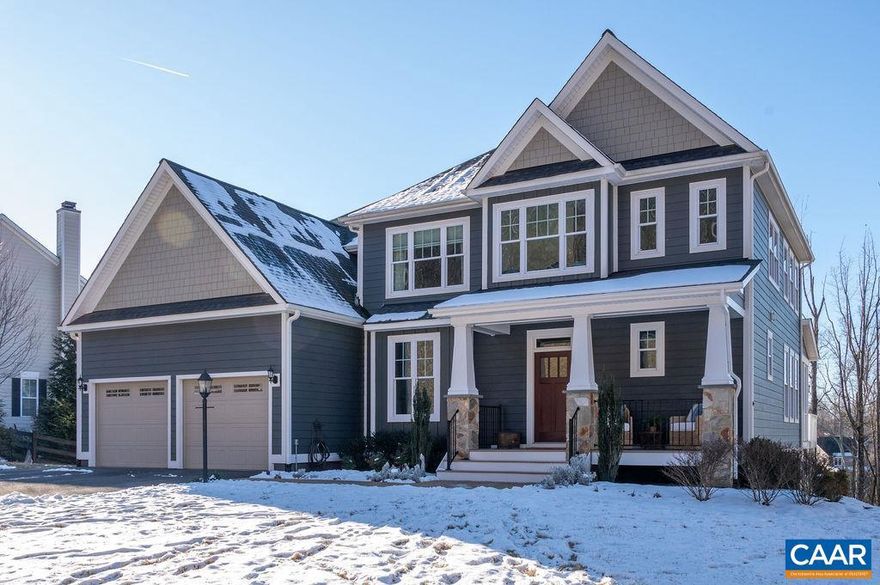 Enjoy gorgeous sunsets over the Blue Ridge & views of the Wintergreen slopes from this 5 BR home in sought-after Hyland Ridge, popular for its convenience, 1/2 acre lots & charming walkability. Sellers were among the first in this section to build & chose this lot for its elevated, southern exposure & slight curve in the road, allowing perfect view orientation off the back of the home. This Earthcraft certified home also includes solar panels reducing total electricity bills to under $6 a month! 2-story great rm features walls of windows flooding the home w/natural light & layered views of pond, woods, city lights & mountains. Great rm opens to the beautifully appointed kitchen w/ white cabinets, granite, stainless, gas, walk-in pantry & informal dining. French doors lead to the fabulous screened porch w/ stone FP & expansive back deck. Main level in-law suite offers attached bath w/ zero entry shower. Deluxe 2nd level primary suite features attached bath w/ soaking tub, glass shower, double vanities & heated floors. Sunny walk-out terrace includes family rm w/kitchenette, BR & full bath, home theater, abundant storage & even a greenhouse! This one owner home was meticulously designed for energy efficiency, function & fun!,Granite Counter,Painted Cabinets,White Cabinets,Wood Cabinets,Exterior Fireplace,Fireplace in Great Room