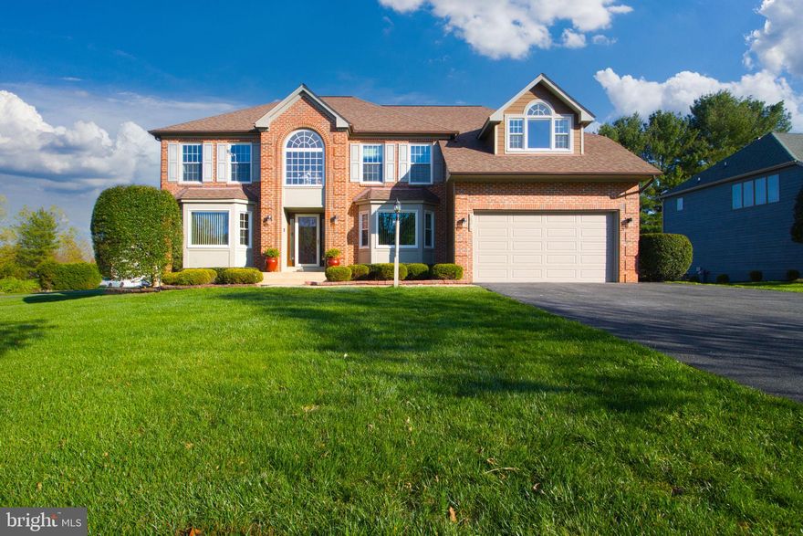 Seller has found home of choice! Welcome to this stunning Colonial home offering over 5,400 sq ft of luxurious living space! This beautiful property features 5 bedrooms and 4 full bathrooms, including a main floor bedroom and full bath, ideal for guests or multigenerational living. The open-concept  layout is perfect for entertaining, with a two story family room that boasts expansive windows, allowing for an abundance of natural light. Step through the sliding glass door to a beautiful deck that overlooks the lush yard, perfect for outdoor relaxation. The newly remodeled kitchen is a chef's dream, showcasing sleek quartz countertops and stainless steel appliances, while the two-sided wood burning fireplace can be enjoyed from the kitchen as well as the family room. Upstairs, you will find a luxurious primary suite  complete with a cozy sitting area, a large walk in closet, and a freshly updated en suite  featuring a soaking tub and walk in shower. Three additional bedrooms and an updated full bath complete the upper level. The fully finished lower level offers even more space to enjoy, with a large recreation room, bar, and game area, plus an exercise room, office/den, space full bathroom, and spacious storage room. An oversized attached two-car garage and a spacious driveway ensure ample parking. Conveniently located just minutes from restaurants, shopping, and major commuter routes, this home offers easy access to golf courses and parks, making it an ideal blend of comfort, and convenience. This home offers everything you need and more! Recent updates include New roof(2017), Hardy board siding(2017), Windows-50 year transferrable warranty(2011), kitchen appliances(2025), new carpet and freshly painted. Don't miss the chance to make it yours!