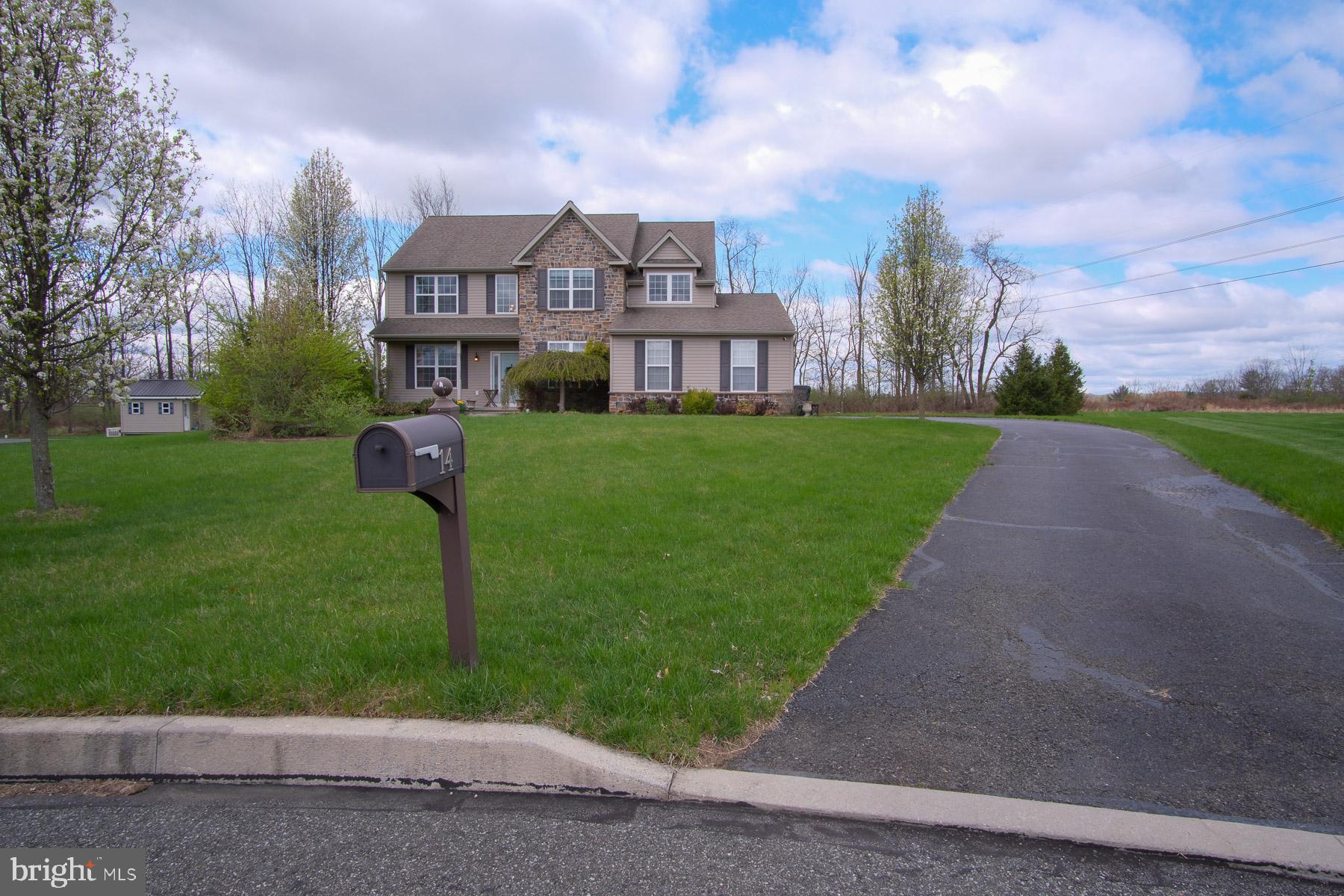 Welcome to 14 Tiffany Circle. Located in beautiful Berks County an easy commute to the Lehigh Valley as well as Bucks Montgomery & Phila Counties OPEN HOUSE SATURDAY APRIL 26TH & 27TH 12:00-4:00
4 bedrooms, 2.5 baths tucked at the end of a cul-de-sac & is located in the esteemed Reserve at Bally Springs. Upgrades galore! Step on the covered front porch & open the front door where you are immediately greeted with a two story foyer 9 ft ceilings natural oak hardwood floors An open concept floor plan that blends the family rm, breakfast rm & kitchen makes for ideal entertaining or family get togethers The kitchen features upgrades including 42" cabinets granite countertops GE profile stainless steel appliances center island & pantry The family room boasts a gas fireplace with floor to ceiling stone There is a 1/2 bath & a first floor laundry rm & outside entrance 20x25 Trex deck overlooking the a private backyard 2nd level entry through double doors to the primary suite with tray ceiling walk in closet sitting or exercise area & bath with double vanity soaking tub tiled glass shower & linen closet 2nd level is complete with 3 additional bedrooms & hall bath A large walkout basement for plenty of storage or finish to your liking R38 insulation & 2x6 construction for efficiency Oversized 2 car garage offers storage a work area Extended driveway The community provides basketball/tennis courts & playground So many things can be said about this gorgeous home & all of its amenities