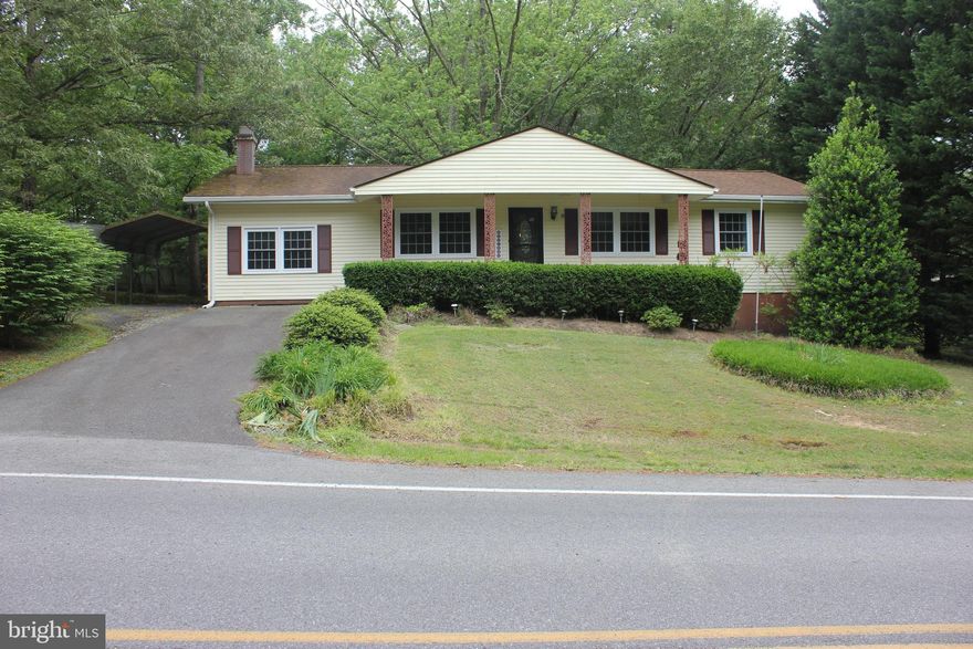 Welcome to your new home in a neighborhood with no HOA's on almost 1/2 acre of land.  This rambler has 3 bedrooms and 2 baths, Carport, Large Backyard with Shed. Large Screened in porch that is great for entertaining .  Inside the Kitchen is  upgraded with 42" cabinets. Family room with wood burning fireplace and hardwood floors throughout. Please give this home a look. Being sold as is.