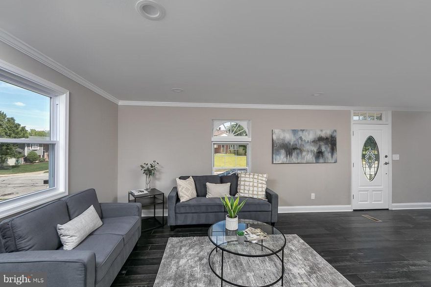 Welcome to "The Shetlands". This contemporary renovated colonial is designed to "WOW" your buyer. Walk into an open floor plan with new distressed hardwood flooring, a large living space, separate dining area and "conversation room" off of the main living room. Recessed lighting, and custom modern light fixtures throughout add that personal touch to make "The Shetlands" the one your buyer has been searching for. The brand new gourmet eat-in kitchen was designed with "The Chef" of the house in mind. It has all new stainless steel appliances and lots of counter prep space to prepare home cooked meals. The finished lower level has a full bedroom and bath, and a large family room, perfect for entertaining guests. The huge deck is just in time for those summer family cookouts. The upper level has 4 full bedrooms with a custom master suite. This IS your home, COME AND GET IT before it is gone!