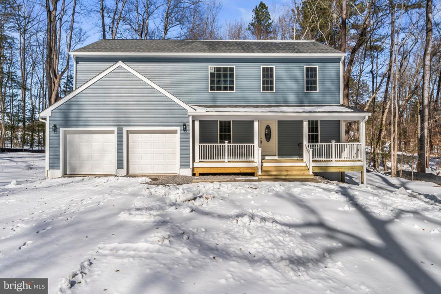 Welcome Home! Brand new 2025 Colonial offering approximately 2,667 sq ft in the gated Lake Caroline community, situated on a flat double lot with lake views and modern finishes throughout. This move-in ready home features an open-concept layout with quartz countertops, oversized island, 42” cabinetry, stainless steel appliances, and expansive living and dining spaces designed for both everyday living and entertaining.
The home includes 3 bedrooms supported by a 3-bedroom alternative septic system, plus two additional bonus rooms ideal for office, nursery, library, guest space, or media room. With 3.5 bathrooms, upper-level laundry, and flexible living areas, this home offers the space and versatility today’s buyers are looking for.
Enjoy lake views from the covered front porch and outdoor living on the completed rear deck. The two-car garage and U-shaped driveway provide ample parking and easy access. Generator inlet installed for added convenience and peace of mind.
Located in Lake Caroline, a private gated lake community featuring two marinas, sandy beaches, boating, fishing, pool, clubhouse, tennis, pickleball, trails, playgrounds, and 24/7 security.
New construction, flexible layout, double lot, and lake community living—schedule your showing today.