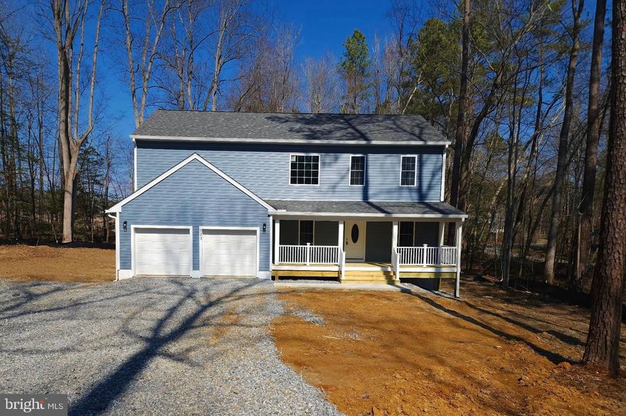 Welcome Home! Brand new 2025 Colonial offering approximately 2,667 sq ft in the gated Lake Caroline community, situated on a flat double lot with lake views and modern finishes throughout. This move-in ready home features an open-concept layout with quartz countertops, oversized island, 42” cabinetry, stainless steel appliances, and expansive living and dining spaces designed for both everyday living and entertaining.
The home includes 3 bedrooms supported by a 3-bedroom alternative septic system, plus two additional bonus rooms ideal for office, nursery, library, guest space, or media room. With 3.5 bathrooms, upper-level laundry, and flexible living areas, this home offers the space and versatility today’s buyers are looking for.
Enjoy lake views from the covered front porch and outdoor living on the completed rear deck. The two-car garage and U-shaped driveway provide ample parking and easy access. Generator inlet installed for added convenience and peace of mind.
Located in Lake Caroline, a private gated lake community featuring two marinas, sandy beaches, boating, fishing, pool, clubhouse, tennis, pickleball, trails, playgrounds, and 24/7 security.
New construction, flexible layout, double lot, and lake community living—schedule your showing today.