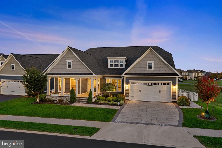 Offer Deadline: Mon, 10/27, 6PM<br><br>Do not miss this rare find, Ranch Home! A statement! Presenting the perfect blend of luxury & comfort. Drive into concrete tile driveway + lead walk, greeted to front covered paver porch for quite mornings & evening relaxation. Sited on premium corner pad w/humongous common area at front, side, & rear, nestled in 'The Greens Village' of Willowsford Community, where every village provides an unique character; an interconnection of 4 villages, to enjoy its amenities!<br> <br>This precious home boasts 4,758 fin sqft, spanning over 2 levels, appointed by 4 bedrms, 3 full upgraded bathrms, & powder. Step inside this gorgeous home to celebrate classic modern elegance!<br> <br>Home is welcomed w/rich hardwood floors, vibrant accent walls, delightful light fixtures, & recessed lights throughout, allowing a warm texture. Cased opening to liv, & French glass doors w/transom to lib, on either side of foyer, accomplishes formal touch. Archway at foyer adds an architectural interest, setting tone to casual part of home, seamlessly. Fine details include crown moldings, chair railing, trims, beam, & tray ceilings. Natural sunlight gushes thru long windows that are adorned w/high end drapery rods & custom blinds. Kitchen is a chef’s delight! Timeless cabinets w/brass hardware, under & up cabinet lighting, pendants, gourmet w/upscale SS appliances, granite counters, tile backsplash, undermount sink, gigantic center island, & pantry. Kitchen smoothly flows to din, & effortlessly to great rm; the heart, where linear gas fireplace w/mantle, marble tile to ceiling, having ceiling speakers & stylish fan, becomes an ideal space for cozy gatherings. Breezing thru hall area is the grand primary suite w/large walk-in closet, trendy fan, spa-inspired bath featuring dual vanities, glass shower enclosure, linen closet, & private water closet. To continue on, are two secondary bedrms that share a hall bath. Convenience aspect, laundry w/cabinets at main level! Mud area w/cubbies completes it!<br> <br>Wide open modern oak staircase to lower level laid w/LVP floors. An enormous rec area w/numerous TV locations, & ceiling speakers. Wet bar w/buffet island, pendants, under cabinet lighting, granite counters, sink, subway backsplash, glass cabinets, & wine rack. Vast fourth bedrm w/walk-in closet & dual entry full bath. Exercise rm w/closet! Wait to immerse & experience recently completed exquisite 3D sound home theater; 9.2 Dolby Atmos, a high-end surround system configuration! Movie theme carpet, wall scones & moldings, offer the ambience! Wide double door walkout exit to magnificent backyard!<br> <br>Backyard is a show stopper! 950 sqft masonary patio; extending living space to outdoors! The concrete paver path to the side of the home, enhanced by beautiful landscaped bushes & outdoor rock speakers, is set from driveway to extensive hardscape, highlighting fire pit, seating arrangment around, hot tub, bar w/barbeque grill & ref, & sitting area tucked under deck hooked for TV connection, Bose speakers, & an outdoor fan. Two sizeable under deck storage areas, w/one of them w/gas connected stove & grill. Ample lighting at patio & greenspace, flood lights, & boundless number of outdoor planters w/water sprinklers. Irrigation system  installed to keep lawn & flower beds lush & green. Huge screened-in deck off of great rm thru patio door & its stairs thru storm door to backyard; deck features Bose speakers, ceiling fan, & roller shades to keep it cool in summers. Fenced yard w/mature tree line for exceptional privacy. Oasis of space & vibe for entertaining!<br> <br>Unique garage that gives an atmosphere of a living space! Finished conditioned garage w/mini split air conditioner-heat pump, large concrete tile flooring, an overhead 2-light residential fluorescent lighting, built-in bench w/storage, a storage cabinet, garage opener w/keypad, & benefit of a service door for easy in & out access!<br> <br>Charm to tour & own!