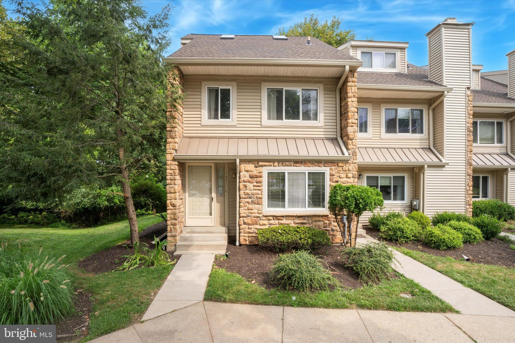 Now Available – 2 Bed / 1.5 Bath End Unit Townhome with Loft in Chesterbrook!
Now available, this beautifully updated 2-bedroom, 1.5-bath end-unit townhome with loft is located in the desirable Chesterbrook community. As you enter through the front door, you're welcomed by an open layout styled in a fresh, neutral color palette that’s perfect for both entertaining and everyday living. The first floor features hardwood flooring through the main living and dining areas, while the kitchen is finished with tile flooring for both style and durability. The kitchen is equipped with stainless steel appliances, white cabinetry, granite countertops, and a classic white subway tile backsplash. The dining area flows seamlessly into the living space, and a convenient powder room completes this level. Sliding doors lead to a private back deck that overlooks peaceful wooded views, offering a tranquil space to relax outdoors. Upstairs, the recently renovated full hall bath includes a tub/shower combo and is accessible from both the hallway and the primary bedroom. The washer and dryer are also conveniently located in the bathroom. The spacious second bedroom sits at the front of the home and includes two closets for ample storage. The primary bedroom is generous in size with vaulted ceilings, a large closet, a private balcony, and a second-story loft complete with built-in desk and shelving—ideal for a home office or creative space. This home is powered by electric heat, electric hot water, and electric cooking. The HOA covers lawn care and snow removal for hassle-free living. Two assigned parking spaces are included. Small dogs are welcome with a $50/month pet fee; cats are not permitted. HOA one-time move-in fee of $250 is required and will be the responsibility of the tenant. Situated just off Route 202, this prime location offers quick access to Route 76, Route 30, King of Prussia, Malvern, and Center City Philadelphia. Shopping, dining, and daily conveniences are just minutes away. Applicants must have a credit score of 690 or higher and a monthly income of at least three times the rent.