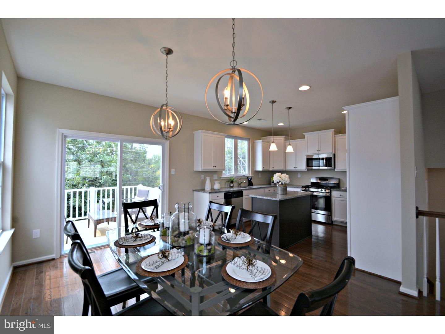 Last quick delivery available!!! Call Ellen for a showing of this home! 267.234.1775! HOMESITE 15 - Move in June/July 2017!! Carillon Hill is a quaint enclave of courtyard home sites, offering tree-lined interior streets, all underground utilities preserving the community aesthetics, public sidewalks and a wide spectrum of models and floor plans. This Burke Twin model home offers 3 floors of living space! A covered porch entry leads to the warm and welcoming hardwood entry foyer with an oak staircase. You'll be impressed with the spacious design which offers an amazingly open and spacious living area complete with hardwood floors. Large sunlit open great room provides a living and dining area, that opens to an expansive white kitchen with granite countertops, stainless steel appliances, and a layout to please any chef of the household combined with the comfort of a breakfast nook. Glass slider off breakfast nook leads to an outside deck, perfect for outdoor relaxation, entertainment and barbecues. Upper level bedrooms: owner's suite retreat complete with tray ceiling, walk-in-closet and owner's bath with dual culture marble top vanities, ceramic tile seated stall shower and ceramic tile flooring. 2 additional bedrooms and hall bath with tub. Convenience of a 2nd floor laundry room just off the bedrooms' hallway. Terrace level features a walk-out finished bonus room which leads out to a private yard for a getaway from the hustle & bustle of the household (valued at $7,500). 2 car oversized garage, 9' Ceiling on main floor living area. Information Center onsite is located across the street from Wayside Florist in Sellersville.