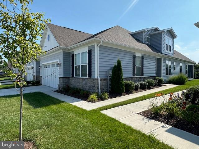 OPEN SATURDAY, AUGUST 2, 1:00-3:00! Welcome to Bay Bridge Cove, one of the most desirable 55+ communities on beautiful Kent Island. This sought-after Oxford model is only three years old and has been upgraded throughout. Located on a premium private lot backing to a wide grassy area, trees, and a proposed bike path, Many construction updates include an expanded footprint with extensions to the great room, guest room, sun room, and screen porch, a huge second-level loft bedroom with finished storage and a third full bath, and a premium electrical package. Custom design upgrades include upgraded luxury flooring, premium kitchen countertops, and appliances. The house has been custom-painted, and there are custom blinds and window treatments throughout. The main level features a primary suite with a spacious walk-in closet, a guest bedroom or office adjacent to a full bathroom, and a convenient main-level laundry room. This amenity-rich community offers an outdoor pool, tennis, pickleball, and bocce ball courts, a crab shack, community herb and vegetable gardens, walking paths, a community center with an exercise room, a meeting room, a library, a game room, and a dog park. The community is ideally located, with less than a 5-minute drive to the Bay Bridge, shopping, golf, and waterfront restaurants. It is also within walking distance to the Kent Manor Beach Club. It offers easy access to the Cross Island Trail, public parks, Annapolis, BWI, Baltimore, D.C., and multiple nationally recognized medical facilities. Home, sweet home!