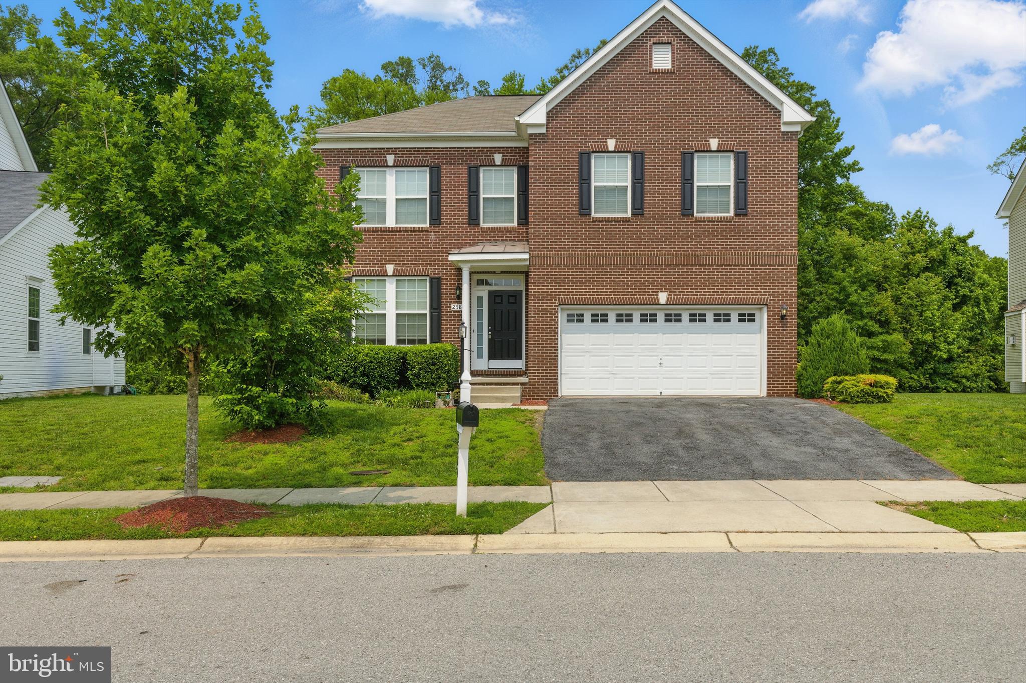 NEW LOWER PRICE!!!
Beautiful & affordable luxury home built only 9 years ago featuring gleaming hardwood floors, granite countertops, stainless steel appliances, crown molding, walk-in closets, 9-foot ceiling, recessed lighting, and a whole lot more. On the main level you will find the living room, dining room, family room and kitchen opening to the large backyard via a sliding patio door. On the top level you will find four good sized bedrooms - one of which is the master bedroom with its own full bath. A hallway bathroom is also on this level. The lower level could serve as an in-law suite with two bonus bedrooms, kitchenette, full bathroom, and a second laundry. This home offers an easy commute to DC & VA with a whole lot of extras. Will not last long!