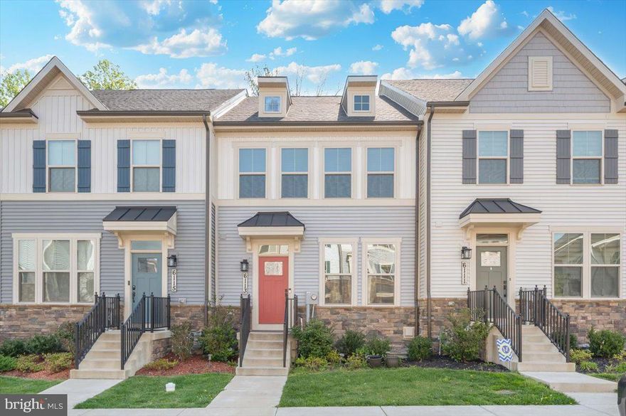 Discover upscale living in this impeccably maintained four-level Luxury 'NV Homes' townhome, ideally situated in the highly desirable Lake Linganore community. This residence offers an exceptional blend of elegant design, generous space, and everyday comfort. The main level features a bright open-concept layout with 9-foot ceilings, a spacious living area, dining space, and a gourmet kitchen complete with a large island, stainless steel appliances, double ovens, and premium finishes. Step out onto the expansive covered balcony—perfect for entertaining or relaxing. A convenient half bath completes this level. The home also enjoys a private wooded rear view, offering added tranquility. Upstairs, the luxurious primary suite features a walk-in closet, dual vanities, and a stylish stand-up shower. Two additional bedrooms and a full bath provide ample space for family or guests. A spacious laundry room with washer and dryer included adds everyday convenience. The fourth level offers a spacious suite with a full bath, large closet, and comfortable sitting area—ideal as a private retreat or versatile living space. The fully finished 850 sq. ft. walk-out lower level includes a private bedroom with a full bath, making it perfect for guests, a home office, or a fitness space. It also features a home theater with upgraded in-wall speakers for an immersive entertainment experience. Double patio doors open to a wooded view, providing added privacy and natural light, along with additional space ideal for a bar or entertaining area. Conveniently located just minutes from I-70 and I-270, the home offers easy access to Baltimore, Washington, DC, the MARC train, and nearby shopping and dining. Residents enjoy exceptional community amenities, including four swimming pools, two private beaches with lake access, over 35 miles of scenic hiking and biking trails, basketball, tennis, and volleyball courts, community centers, sidewalks, and multiple playgrounds—including one on the same street. The community also features weekly food trucks, farmers markets, concerts, and year-round events.  The award-winning Oakdale Schools are ideally located nearby, providing access to top-tier educational opportunities. Don’t miss this rare opportunity to own a beautifully appointed home in one of the area’s most sought-after communities.