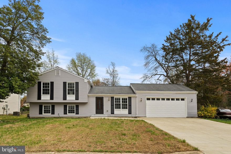 This beautifully maintained home is packed with impressive features. The front of the house showcases a pristine driveway that leads to a spacious two-car garage, offering plenty of private parking. Additional street parking is also available. Inside, you’ll be welcomed by an inviting, open-concept living and dining area, seamlessly connected to a stylish gourmet kitchen. The kitchen, complete with a striking granite island and modern stainless steel appliances, is truly a standout and an ideal space to gather. The main floor is finished with high-quality laminate flooring, enhancing the home’s appeal. Upstairs, you’ll find three bedrooms and two full bathrooms. The lower level features a half bath and serves as an excellent space for both entertaining and unwinding.