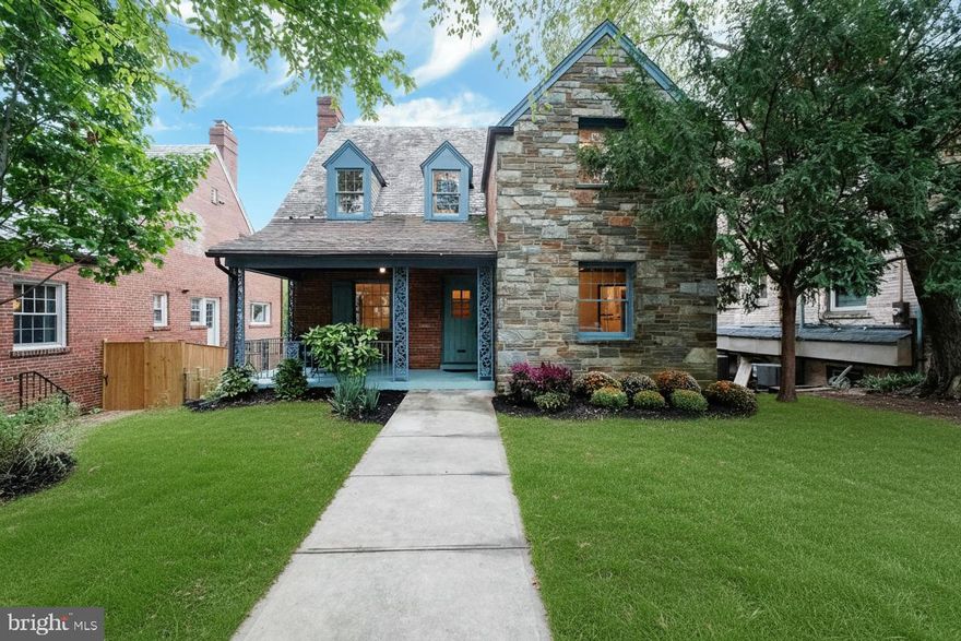 OPEN HOUSE SUN NOV 30th CANCELLED. Full of character, this classic AU Park Tudor offers an inviting layout and incredible walkability in the heart of Tenleytown. 

A double-height foyer, original woodwork and mouldings, and crystal door knobs set the tone for this charming home. The main level features a generous Living Room with a coffered ceiling and wood-burning fireplace, plus a flexible ensuite Bedroom/Family Room or Office. The expanded Kitchen includes a JennAir range, bar sink, wine fridge, and a tucked-away laundry alcove, and opens to a sun-drenched Dining Room and a spacious Deck overlooking the fully fenced backyard—perfect for play, gatherings, and easy indoor–outdoor living. Even the private, set-back front porch is a rare retreat, tucked quietly away from the street—ideal for saying hello to neighbors or sipping your morning coffee while watching the world go by.

 Upstairs, the Primary Suite includes two closets and a private Bath, with two additional Bedrooms and a full hall Bath completing the level. A dormered attic offers excellent expansion potential or abundant storage. The walkout Lower Level includes a Family Room with fireplace, Den/Guest Room, Full Bath, and separate entrance—ideal for guests, work-from-home, or adding a kitchenette for a possible rental/au pair suite.

With gated two-car parking and a location steps from restaurants, grocers, fitness studios, and Metro, this home blends charm, flexibility, and everyday convenience in one of DC’s most desirable neighborhoods.