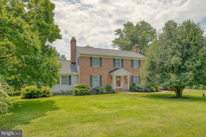 ***MULTIPLE OFFERS RECEIVED—OFFER DEADLINE Sunday 8/13 @8pm ***Welcome to this charming colonial-style residence nestled in the desirable Pleasant View Farms neighborhood. This 4-bedroom, 2.5-bathroom home boasts an array of attractive features that are sure to captivate any discerning buyer. Step into the inviting living room, adorned with elegant crown molding, plush carpeting, and a cozy wood-burning fireplace, creating the perfect ambiance for relaxation and gatherings. Flowing seamlessly from the living room is the dining room, showcasing the same beautiful crown molding and carpet. Adding to its charm is a chair railing, enhancing the sophisticated appeal of the space. French doors connect the dining room to the well-appointed kitchen, which boasts abundant counter space, stainless steel appliances, and recessed lighting. The built-in desk area provides convenience, and the table space area is ideal for casual dining. The kitchen also offers easy access to the outdoor deck through a sliding door, perfect for al fresco dining and entertaining. Conveniently located on the main level, the laundry room offers practicality and ease of use. Adjacent to this, you'll find a tastefully designed half bath. The family room on the main level is a focal point of comfort, featuring plush carpeting, crown molding, and another wood-burning fireplace. Sunlight floods the space, creating a bright and welcoming atmosphere. The built-in bookshelves provide both style and functionality, while French doors lead to the inviting screened-in porch, offering a lovely spot to unwind. Upstairs, the upper level houses the primary suite, providing a private retreat. Additionally, there are three other well-proportioned bedrooms that offer versatility for various needs. The basement remains unfinished, providing ample opportunity for customization and personalization to suit your preferences. This property also boasts an oversized attached garage, ensuring ample space for parking and storage. Outside, a delightful gazebo with built in bar awaits, perfect for outdoor gatherings and relaxation. The lush and level 1.25 acre yard further enhances the property's appeal, providing a scenic and serene setting. This home offers a truly enchanting experience, blending comfort, functionality, and aesthetic appeal seamlessly. Don't miss the opportunity to make it your own. Schedule a showing today and witness the beauty and charm of this remarkable residence.