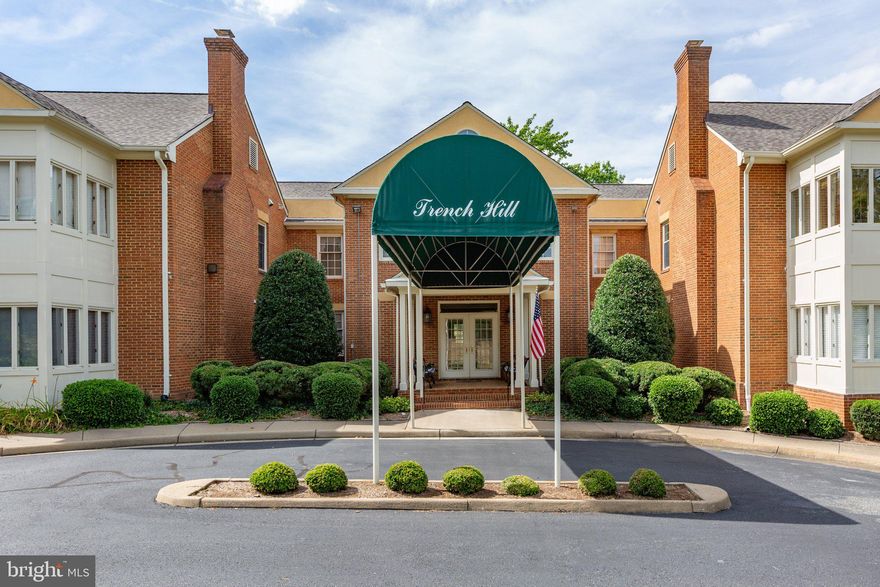 Amazing opportunity downtown Fredericksburg in a tranquil area, walking distance to downtown restaurants and shops near University of Mary Washington. Trench Hill Condominiums is just 12 units, well designed with no shared walls, welcoming foyer with sitting areas and outdoor picnic area. This condo has 2 bedrooms, 2 full baths with 1,216 sq ft, with 10 ft ceilings, one assigned parking space and a view of Trench Hill & the city from the sun room! The spacious living room has LVP floors, fireplace w/lovely mantle and hearth, crown molding and french door to an amazing sunroom! You may just want to live in this sunroom with its view. It has carpeting and a ceiling fan with light. Dining room has LVP floors, crown molding, chandelier, chair rail and open flow concept with living room. Kitchen has tile floor, laminate counters, drop in stove, stainless steel double bowl sink, built in microwave, and wood cabinets. Primary suite has LVP floors, ceiling fan w/light, and a double door closet. The ensuite has tile floor, a double sink vanity and lovely, tiled walk in shower. Second bedroom with LVP floors, ceiling fan and single door closet. Hall bathroom has tile floor, single sink vanity and a tub/shower combination. This is a rare opportunity you do not want to miss!