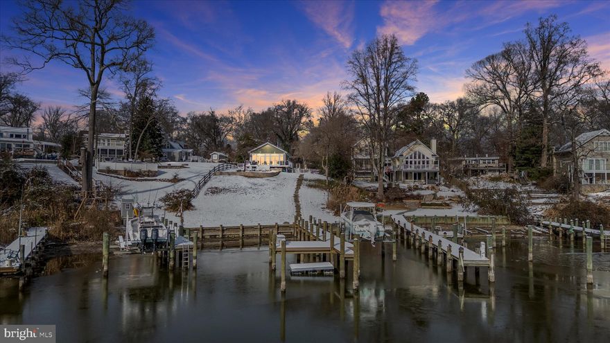 Waterfront luxury meets modern comfort at 1627 Lakewood Road.
This beautifully updated two-bedroom, two-bath waterfront retreat perfectly blends high-end finishes with effortless coastal living. From the moment you step inside, you’ll notice the thoughtful craftsmanship and quality details throughout—no expense spared.

The gourmet kitchen is a chef’s dream, featuring a Jenn-Air 42” counter-depth refrigerator, 48” six-burner gas range with griddle and dual ovens, super-quiet dishwasher, under-counter microwave, bar refrigerator, and built-in ice machine—all complemented by RO water filtration and a whole-house water softener. The open living area is designed for both comfort and entertainment, complete with 7.2 surround sound, remote-controlled blinds, and a Yamaha sound system that connects the house, deck, and dock via Wi-Fi.

The home’s primary suite offers a spa-like escape with a double-bowl vanity, whirlpool tub, and comfort-height fixtures, while the guest bath features a walk-in shower. Enjoy year-round efficiency with hot water radiant floor heating, a Navien 95% efficient boiler, and high-performance Marvin windows and doors.

Outdoor living is simply exceptional. A maintenance-free wraparound deck with sound system, propane grill connection, and high-visibility railing sets the stage for gatherings overlooking the water. The new pier offers 12,000 lb remote lift, floating pier, timer-controlled lighting, and Wi-Fi-connected speakers—an entertainer’s paradise. The new paver patio, retaining wall, and driveway, along with Hardie siding and foundation waterproofing system, ensure lasting beauty and durability.

Nestled on a fenced lot with scenic views and easy access to the water, this home is turn-key, low maintenance, and perfectly designed for those who appreciate both elegance and function.