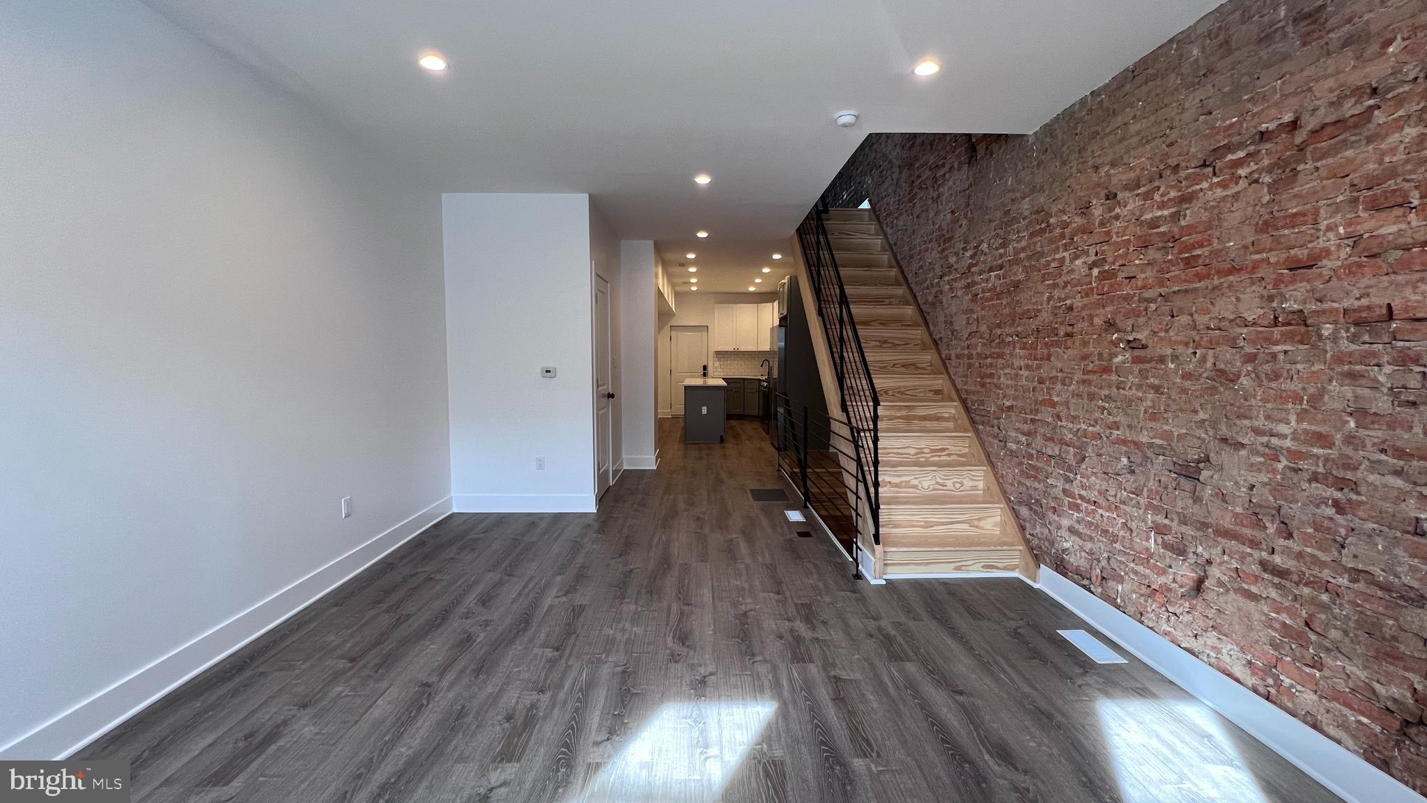 Welcome home to recently renovated home. 1424 S. 22nd street is located in the Point Breeze section of South Philadelphia. This area is red hot with new development and up and coming bars and restaurants. Close proximity to Rittenhouse Square and the Passyunk Square neighborhoods. This home features 2 bedrooms and 2.5 bathrooms. The main floor boasts a well appointed multi color shaker kitchen, with center island, white quartz counter tops, and stainless steel appliances. All mechanical services are brand new, with a high efficiency heating/cooling system. Second floor front bedroom is the owners suite, it features an en-suite bathroom with subway tile shower, black hex floors, and 2 personal closets. Rear bedroom also has its own full bathroom, located in the main hallway. The lower level basement can be used for dry storage. The laundry connections along with washer and dryer is located in the basement. This home is located in a booming part of South Philly, close to public transportation, and all that downtown Philadelphia has to offer! Make your appointment today to see this fantastic home!