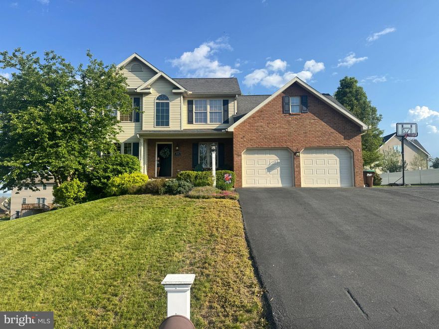 Lovely 2-story colonial in a desirable neighborhood with a spacious, functional floor plan. The main level features a open kitchen with breakfast bar and nook that opens to the cozy family room with fireplace, plus formal living and dining rooms for added entertaining space. Offering 5 bedrooms and 3 full baths, including a convenient main-level bedroom and nearby full bath—perfect for guests, use as an office or other flexible living needs. Main-level laundry adds everyday convenience. Enjoy outdoor living on the rear deck overlooking the backyard with mature trees providing shade and privacy and a fence for your pets. Full unfinished basement with walk-out exterior door provides excellent storage or future finishing potential.