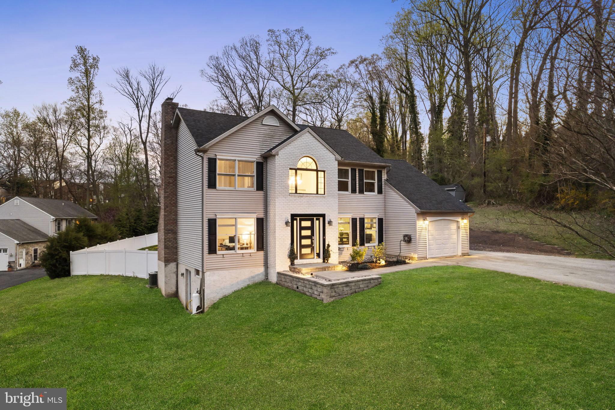 799 Ridley Creek Drive, a stunningly updated and move-in-ready 3-bedroom, 2.5-bath home in one of Media’s most desirable locations. This exquisite residence seamlessly blends sophisticated interior living with an exceptional resort-style backyard, offering nearly an acre of private tranquility adjacent to Ridley Creek and just minutes from major highways, Philadelphia International Airport, and vibrant downtown Media. As you enter, soaring ceilings in the open foyer create an inviting sense of space and elegance. The main level features a formal dining room perfect for hosting dinner parties, a dedicated home office ideal for remote work, and a cozy living area centered around a charming wood-burning fireplace. The gourmet kitchen impresses with quality cabinetry, sleek appliances, and stylish finishes, making it equally suited for everyday family meals or entertaining guests. The second level offers three spacious bedrooms with the primary bedroom featuring a vaulted ceiling, walk in closet and a thoughtfully renovated bathroom with contemporary, spa-inspired fixtures. The main level laundry room includes ample storage and thoughtful function for added convenience. A fully finished lower level expands the living space with a custom stone bar, an exercise room, and a separate entrance, offering flexible options for your home gym, guest suite or home theater. Step outside to discover an entertainer’s paradise, a Gunite saltwater pool with an attached spa and custom LED lighting creates a serene oasis for relaxation and gatherings. The backyard also features a built-in firepit, a weatherproof entertainment system with a TV, and a gazebo-covered outdoor dining area, all surrounded by professionally installed paver walkways and retaining walls that enhance both function and curb appeal. The expansive custom deck provides the perfect setting for alfresco dining, while the private wooded homesite ensures peace and privacy. This exceptional home offers quick access to I-476, I-95, and Center City Philadelphia, combining suburban serenity with urban convenience. This is an opportunity to own a move in ready home with luxury finishes and resort-style amenities. A must see property to experience the perfect blend of comfort, style, and location at 799 Ridley Creek Drive.