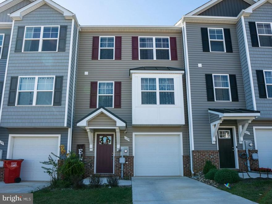 Welcome Home to Your Dream Townhome!

Nestled in a prime location in West Virginia, this stunning 3-level townhome, built in 2021, offers the perfect blend of modern convenience and country charm. With 4 spacious bedrooms and 3.5 bathrooms, there's ample space for everyone to enjoy.

Step inside to find a large eat-in kitchen featuring sleek stainless steel appliances and beautiful granite countertops—ideal for family gatherings or entertaining friends. The open layout seamlessly connects to the living area, creating a warm and inviting atmosphere.

The entry-level offers versatile space that can easily serve as a bedroom or recreational room, complete with ground-level access to your private rear yard. Imagine relaxing or hosting gatherings on your expansive composite deck, where you can soak in breathtaking country views.

With plenty of closet space throughout and close proximity to amenities and major commuter routes, this townhome is a perfect choice for both convenience and tranquility. Experience the advantages of nearly new construction without the wait—schedule your showing today and make this beautiful property your own!