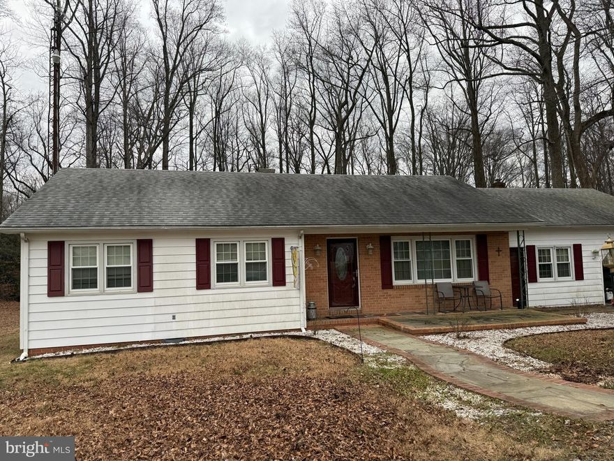 Charming 3-bedroom, 1-bath rancher offers over 1500 SF of comfortable living space.  Several updates have already been completed, making this home move in ready with room to add your own touches.  Enjoy peaceful mornings and evenings on the screened-in rear porch, perfect for relaxing while taking in the surrounding wildlife.  A great blend of comfort, space and natural serenity.