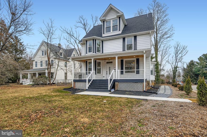 Modern + Luxury + Lifestyle + Tech 6235 Bellona Avenue (Located on Hollen Rd off Bellona Ave) delivers a thoughtfully redesigned, luxury living experience within the highly desirable Cedarcroft–Bellona-Gittings Historic District. While Bellona Avenue offers convenient access to surrounding neighborhoods, the home itself is positioned back along Hollen Road providing a quieter residential feel and a sense of privacy that surprises most first-time visitors. Designed intentionally for buyers who appreciate modern elegance and innovation, this home features two stunning primary suites with spa-like bathrooms, creating a true retreat at the end of the day. The luxury kitchen is a showpiece ideal for entertaining with a large waterfall granite island offering generous seating, perfect for gatherings, casual dinners, or late evenings with friends and family. The home is also fully smart-home enabled, appealing to tech-savvy buyers who value convenience and control. Integrated panels allow you to manage key systems remotely including thermostat settings and washer/dryer functionality so your home works for you whether you’re in the next room or away for the day. Clean architectural lines, abundant natural light, and an open, flowing layout define the interior. Every major system has already been updated, including plumbing, electrical, windows, HVAC, roof, and even windows! Providing true peace of mind and a turnkey ownership experience rarely found in this historic neighborhood. The lower level is professionally waterproofed and features durable epoxy flooring, offering a partially finished space ready for a buyer to complete to suit their needs. Whether additional storage, a home gym, recreation area, or future finished living space. Outdoor living is just as inviting. Enjoy summer days and quiet evenings on the expansive front porch overlooking a large front yard perfect for watching children play or unwinding outdoors. The yard wraps around to a secondary porch with additional green space, complemented by a brand-new driveway for everyday convenience. Set in a vibrant historic community known for its charm, walkability, and proximity to local shops, schools, and neighborhood amenities, this home offers the best of both worlds: contemporary luxury, smart-home functionality, and a prime location in one of Baltimore’s most beloved neighborhoods. This is not a traditional Cedarcroft home and that distinction is exactly what makes it special.