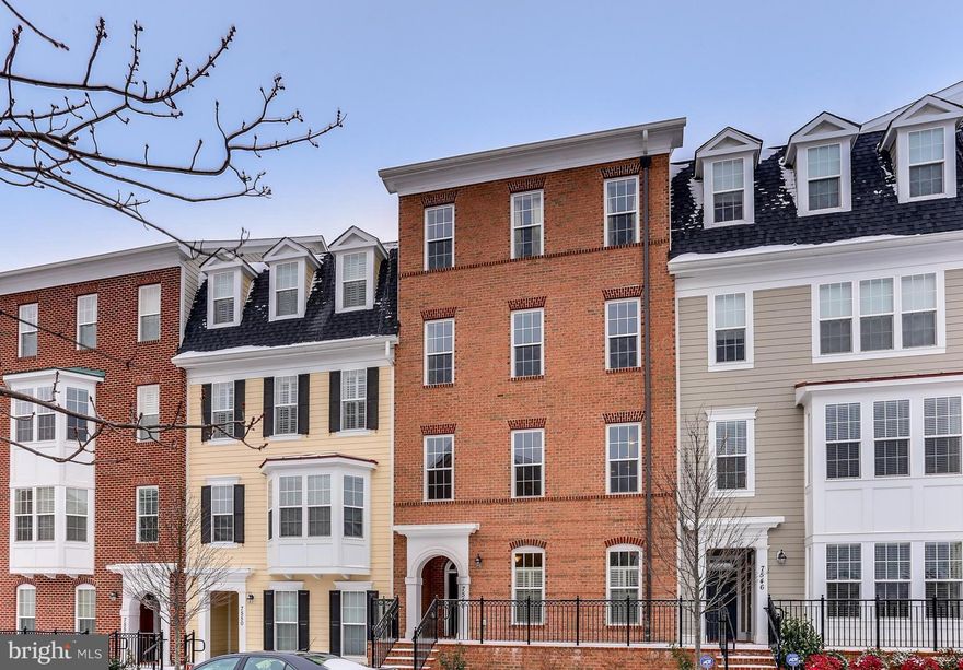 Like new, 2 story Red Maple Condo w/upgraded baths & custom kitchen w/granite & SS appliances. Beautiful hardwoods, generous sized bedrooms & functional open feel allows you to use the lower level family room & upper level living/dining room  w/amazing versatility. No homes behind you, a rare commodity in the highly sought after community of Maple Lawn w/awesome amenities!