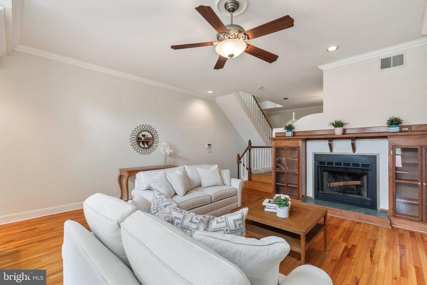 Welcome to 104 Christian Street, a unique 18’ wide home in Queen Village, one of Philadelphia’s most sought-after and charming neighborhoods. Step inside a light-filled and spacious living room, where hardwood flooring flows throughout and a fireplace serves as the focal point. A thoughtfully designed built-in banquette beneath the front window offers additional seating and storage, blending function with character. Continuing through the first floor, you’ll step into the dining room, perfectly suited for hosting gatherings of any size. Through the dining room is the expansive kitchen, a true highlight of the home. Offering an abundance of counter space, ample cabinetry, and natural sunlight, the kitchen also provides room for a breakfast table, making it ideal for both everyday living and entertaining. Sliding glass doors lead to a private deck, perfect for morning coffee or evening relaxation. Beyond the deck is a backyard oasis with plenty of room for grilling and outdoor entertaining.
On the second floor, you’ll find two generously sized bedrooms, a full bathroom, and conveniently placed laundry. Storage will never be a concern in this home, with two spacious closets in the front bedroom, a walk-in closet in the rear bedroom, a linen closet in the hallway and additional storage space in the laundry closet. 
The third floor is dedicated to an impressive primary suite. This upper level welcomes you with an entryway bathed in natural light from multiple skylights. The sizable bedroom is also filled with natural light and offers ample room for both a sleeping and seating area, along with its own fireplace for added comfort and charm. This level also features a large walk-in closet, a separate large linen closet, a bathroom with both a standing shower and jetted tub, as well as a private deck, providing great views of the city.
The fully finished basement provides additional living space, perfect for a cozy family room, playroom, or movie room. This level also includes a convenient half bath and direct access to a large garage, offering additional storage and parking. Completing the home is a front driveway, allowing for easy access and parking for a second car.
Ideally located just steps from Queen Village’s beloved restaurants, cafes, and shops, with easy access to the waterfront, and major transportation routes, this home offers the perfect blend of space, character, and location. Schedule your tour today!