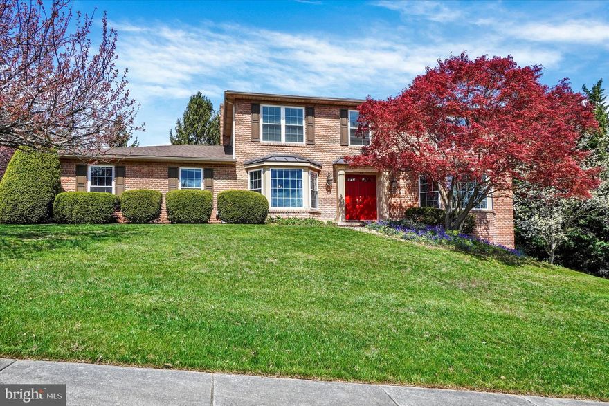 4 BEDROOMS and 3.5 BATHS with a FINISHED BASEMENT all on a gorgeous HALF-ACRE lot in CENTRAL YORK SCHOOLS. Don’t miss this colonial brick beauty nestled in the hills of Penn Oaks South! The main floor boasts a bright, open layout ideal for entertaining, featuring a formal living room, dining room with crown molding and chair rail, and a family room with a brick fireplace. The kitchen offers granite countertops, stainless steel appliances and bar seating. This is open to the eat-in kitchen and family room. Your powder room, laundry room/mud room and side load garage finish off the first floor. Upstairs you will find your primary suite which offers its own bathroom including a double bowl vanity and sky light - accompanied by a very large walk-in closet. Rounding out the second floor there are 3 more great sized bedrooms and a full bath in the hall – also with an oversized double bowl vanity.Downstairs you will find an EXPANSIVE finished basement that walks out to a relaxing brick patio and fountain setup. There are a ton of options down here. It is currently being used as an office, a guest room, rec room, exercise room and bar… still with plenty of open space. Out back you will enjoy your grassy, flat, half acre yard from the deck, brand new hot tub, or brick patio. Newer HVAC and brand new tankless water heater! Schedule your showing today!