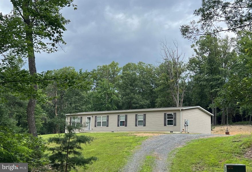 Have you ever dreamed of owning a beautiful home on a private lot that is also being sold with a bordering lot that provides extra privacy or a place for a family member or friends to build or camp on?  Look no further!  This 4 bedroom 2 bath single level home has plenty of space for all of your needs and a great yard to enjoy your outdoor activities.  As you enter the front door you will be welcomed by an open floor plan and a view of the beautiful kitchen this home boasts.   The house rests on a 6.4+/- acre private lot that has a small creek running through it and the additional lot is 2.98+/- acres and has a 2-bedroom septic already installed.  Totaling over 9 acres between the 2 lots this is a dream come true .  All of this is just a quick drive to Winchester, Va or Moorefield, WV. This is an ideal property for someone looking for a getaway or permanent residence in Wild and Wonderful WV to get away from the hustle and bustle.   Call today to schedule your appointment.