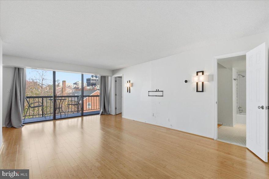 Experience modern comfort in this beautifully updated home! Bright living room with bamboo hardwood floors and floor-to-ceiling windows opens to a private balcony with serene tree-lined views.

The kitchen features granite countertops, stainless steel appliances, and a subway tile backsplash, flowing seamlessly into a dining area perfect for entertaining. 

The primary bedroom includes a walk-in closet and lots of natural light, with a contemporary primary bathroom offering ample storage.

Additional perks: reserved parking (#35), guest parking (first-come, first-served), and a dedicated storage unit. The condo fee includes all utilities except electricity and cable/internet.  (Xfinity and Verizon are the available internet providers). The home features a brand-new water heater and an AC system replaced two years ago. An electronic air filtration unit is also included but not currently in use.

Located within walking distance to two metro stations. The closest is Courthouse Metro Station, approximately 0.5 mile or about a 10-minute walk. Rosslyn Metro Station is also nearby, about 0.7 mile or roughly a 13-minute walk. These stations provide access to the Orange, Silver, and Blue Lines, making commuting to Washington, D.C. and surrounding areas quick and convenient.  Whole Foods, Trader Joe's, Safeway, Target, and dozens of restaurants are also within walking distance.