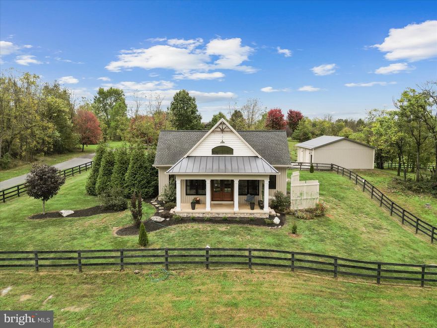 Nestled on 1.79 beautifully landscaped acres, this custom-built in 2018 Craftsman-style home blends timeless character with modern comforts. It Features 3  cozy & unique bedrooms with 6" Amish Milled Oak Floors, Ship Lap Walls, and Cozy Nooks to relax and enjoy.. This home has one of a kind, hand picked light fixtures, bath fixtures, cabinetry and more. The two full bathrooms are beautifully appointed with custom vanities, vessel sinks, Italian tiled floors, ship lap and all glass seamless walk-in showers. This Totally unique home welcomes you with warm wood accents, Beamed Ceilings, Barn Doors and handcrafted details throughout. The main level has an open  floor plan. This level has walls of the best quality windows, soaring ceilings, and surprises you'll love,  around every corner.  The kitchen is complete with stainless steel appliances, including a gas top stove with an electric oven, custom quartz countertops, nice eat in island with open shelving on one side. beautiful hand picked custom soft closed cabinets, gleaming oak floors and more. There's a large great room that combines the living and dining space with 20" vaulted ceilings, large windows to let in the natural light and a lovely elevated half moon window, industrial railed balcony overlooking the family room and a contemporary fireplace built into a shiplap wall. The sunny laundry room  off the kitchen has a large granite counter space for folding clothes along with additional shelving. The sunroom with italian tile flooring has access to the slate and stone patio and has a beamed ceiling and a shiplap accent wall. The main level bedroom also has access to the patio and a large walk in closets with very special built-ins  that will house all of your wardrobe pieces. The main level full bath is spa-like with italian ceramic tiling,  double vessel sink vanity and a glass walled - walk in shower w/ basket weave tile. The upper level has  two more bedrooms,  with the beautiful custom Amish flooring and the second scrumptious bathroom has a very unique and specially tiled shower, distressed looking large mirror and alcove for linens and other storage. The 4' Crawl Space is Conditioned, ( Heatyed and Cooled) and has a small and large Water Softener that shares one Brine Tank. The High End Heil HVAC System is Multi Stage and The Heating is 18.5 Seer and the Cooling is 12.5 Seer. The well is Amazing at 60 Gallons Per Minute. It has a UV Light. Everything about this 1.79 totally board fenced property has been well planned and thoughtfully orchestrated. The  front porch has mountain views in the distance  and pastoral views overlooking the countryside. It is positioned graciously off of the great room for an opportunity to relax, entertain, and watch the world go by. In the backyard, a stone patio surrounds a serene "spool" - a spa-like whirlpoolwith a cascading waterfall, which offers a private oasis for unwinding or hosting guests. Equestrian enthusiasts or hobby farmers will love the  3-stall barn with tack room that has a a large paddock.  Car lovers, mechanics, artists, woodworkers, Man Caver's and She Sheder's,  will appreciate both the attached fully finished 2-car garage with a speckled epoxy floor and the separate 28x30 2-car detached garage that has been insulated and has a standing seam metal roof with snowbirds. The entire property is fully 3 board fenced, providing privacy and security. There is even a large fenced yard for your pets and small children. It would also make a great garden area. With easy access to RT 340, RT 9, RT 7, Hollywood Casino, Summit Point Race Track, Berryville Va., Charles Town WV and Loudoun County for commuter's, all of your location requirements will be covered here.  There is nothing about this home that is typical in any way. If you've had the cookie cutters and are looking for a totally unique home, this one's for you.