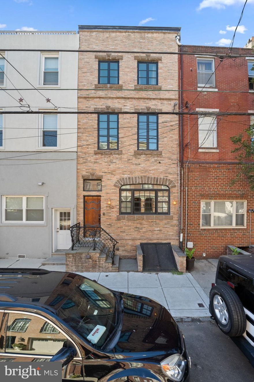 Come check out this 1920 Bella Vista home! As soon as you walk through the custom wood door, you will be blown away by the European charm. The unique layout gives and old school feel with the comforts of the 21st Century. The first floor is completely open space with the benefit of hydronic radiant floors from the first step in to the back of the kitchen. The focal point of the first floor is the Rumsford Fireplace with wood mantle and hand-made tiles. The kitchen is equipped with a gas stove, farmer’s sink, wine fridge and soap stone countertops. The Cypress floors are found throughout and most have been freshly sanded and stained. The stairs lead you up two floors will you will find 4 nice sized bedrooms. Each has its own unique charm. The “main” bedroom has a huge walk in closet. Bedroom two has it’s own suite with a full bathroom and laundry room.  Bedroom three has the option of using the extra space as a walk-in closet or future third full bath. The top Bedroom is currently being used as an office den. The main bathroom has a porcelain tub and a steam shower. As you climb to the top of the stairs you can walk out onto the two-tiered huge deck overlooking the city Of Philadelphia. Views for miles! If that isn’t enough, you can go to the partially finished basement with plenty of storage space behind the closed door. This house has so much space and character, don’t wait to make your appointment to see it! Close to the best Italian food around, a park a block down the street and minutes from local transportation.