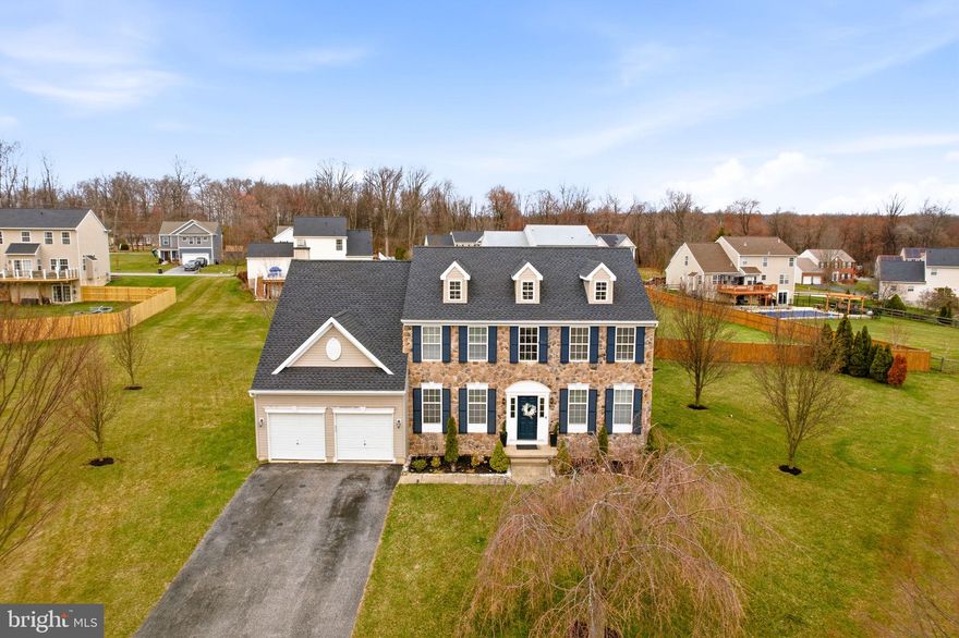 Welcome to this beautiful home in the sought-after Calnshire Estates community in West Caln Township. Situated on a premium cul-de-sac lot with a private, tree-lined backyard, this spacious home offers 4 bedrooms, a main-floor office, and thoughtful updates throughout.
The main level features a bright, open layout with new  flooring throughout, a formal dining room, living room, and a private study that can also serve as a guest bedroom or office. The open kitchen includes a large center island, granite countertops, custom cabinetry, tile backsplash, gas cooktop, wall oven, pantry, and sliding doors leading to the backyard—perfect for everyday living and entertaining.
The two-story family room is highlighted by a floor-to-ceiling stone gas fireplace, built-in shelving, and oversized windows that fill the space with natural light.
Upstairs, the primary suite offers two walk-in closets, a sitting area overlooking the family room, and an en-suite bath with double vanity, soaking tub, and separate shower. Three additional bedrooms and a full hall bath complete the second floor.
The partially finished basement provides flexible space for a bedroom, home office, or recreation room, along with additional storage and room for future expansion.
Additional features include 9-foot ceilings, PEX plumbing system, and an egress window in the basement. New Roof.
Conveniently located near Route 30, shopping, dining  and major routes to Downingtown, Exton, Lancaster, and King of Prussia, this home offers both comfort and accessibility.