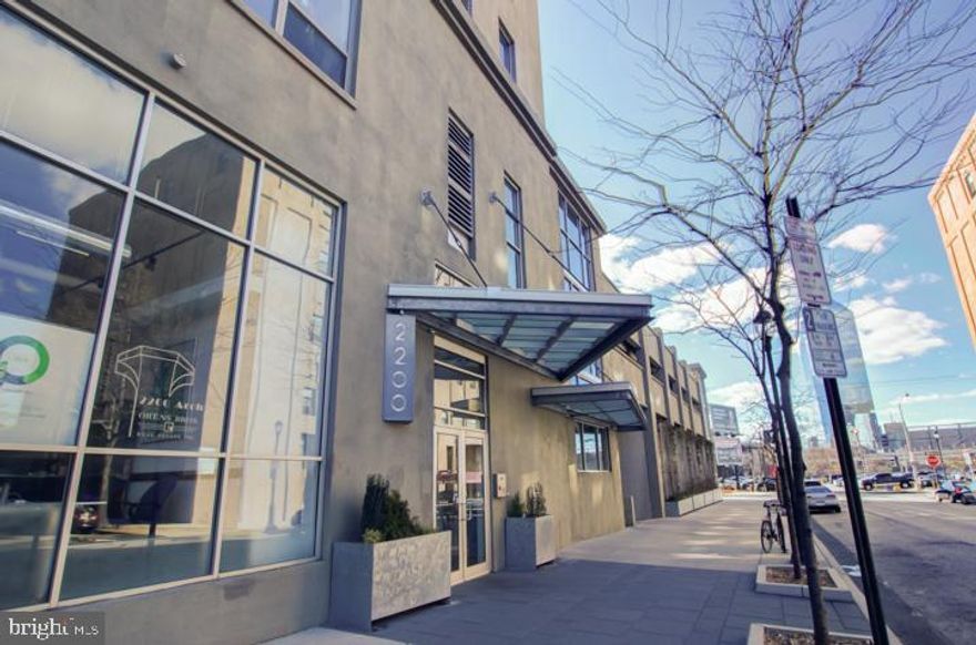 2200 Arch is a luxury loft high-rise condominium with PARKING INCLUDED, 24-hour concierge/doorman service, a well-equipped fitness center, a conference/meeting room. This 3rd floor 2-story loft offers a unique and welcoming mid-entrance to an open floor plan with 14-foot ceilings, panoramic Western views, 3-bedrooms, 2-full bathrooms, and 1300 Sq./Ft of enjoyable living space. The lower level features an open kitchen and living area with hardwood floors throughout, a dedicated laundry room, a full tiled bathroom, and two bedrooms. The larger bedroom is perfect as another master bedroom with built-in closet organizers. The other first-floor bedroom can also be an ideal home office. The upper level offers a large lofted master bedroom or den, with the second full bathroom and a large walk-in closet. 2200 Arch is centrally located to Philadelphia's business, cultural and restaurant districts, and within walking distance to the 30th Street train station, public transportation, The Fitler Club, Trader Joe's, Whole Foods, and Rittenhouse Square. The neighboring Schuylkill River Banks offers trails for jogging, biking, and dog walking. Commuting by car is comfortable with quick access from the parking garage to I-676 and I-76. We invite you to make 2200 Arch your home.