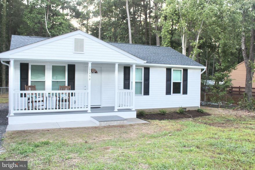 This property is Pinterest approved! From the charming front porch to the back deck this home is welcoming and warm. Every inch of this 3 bed/1 bath rambler has been meticulously renovated using high quality finishes and appliances.  The kitchen is open to the living room maximizing the natural light and unifying the space. In the beautifully updated  bathroom you'll find a  granite topped vanity and brush nickel fixtures.  You'll love the wide-plank laminate floors that are durable and stylish.  All the mechanical systems are high performing and energy efficient. The flat back yard is perfect for your four legged friends. In the community of Drum Point there is beach access to the Chesapeake Bay and a boat ramp in to Mill Creek. Close to shopping, restaurants, NAVAIR, and so much more. Call me today to request a showing.