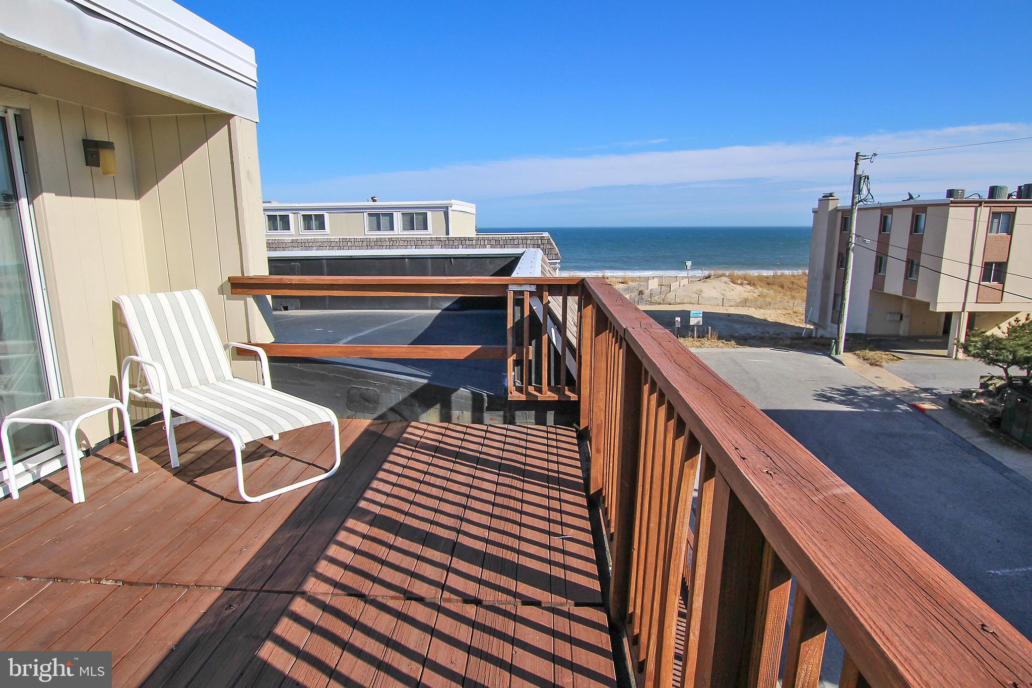 WOW - Ocean block 5 bedroom 3 1/2 bath Townhome just steps to the Beach with 3 ocean view balconies and an Outdoor Pool! For this residence, the Ground level offers a front carport big enough for 2 vehicles, a back carport for 1 vehicle, a bedroom, bathroom and a full size washer & dryer. Level 2 is the main living area with fully equipped & updated kitchen, dining area, living room, powder room, a private back deck with an enclosed outdoor shower & storage and a big front deck with ocean views. Level 3 offers 2 bedrooms, a full bath and a private balcony with ocean views. Level 4 includes 2 bedrooms, a full bath and balcony with ocean views. In 2019, All bathrooms were beautifully remodeled and a new front door and new interior doors installed. Beach Place North had a new roof installed in May 2019 and has a raised walkway for easy access to the beach from the property. This convenient location at 71st St allows for easy access to Rt 90 at 62nd St, is close to many restaurants, shopping & entertainment and only a few miles from the world famous Ocean City Boardwalk. Use the property completely for yourself or collect rental income when you are not enjoying the property and all the Ocean City has to offer. Gross rental for 2020 was over $50K!