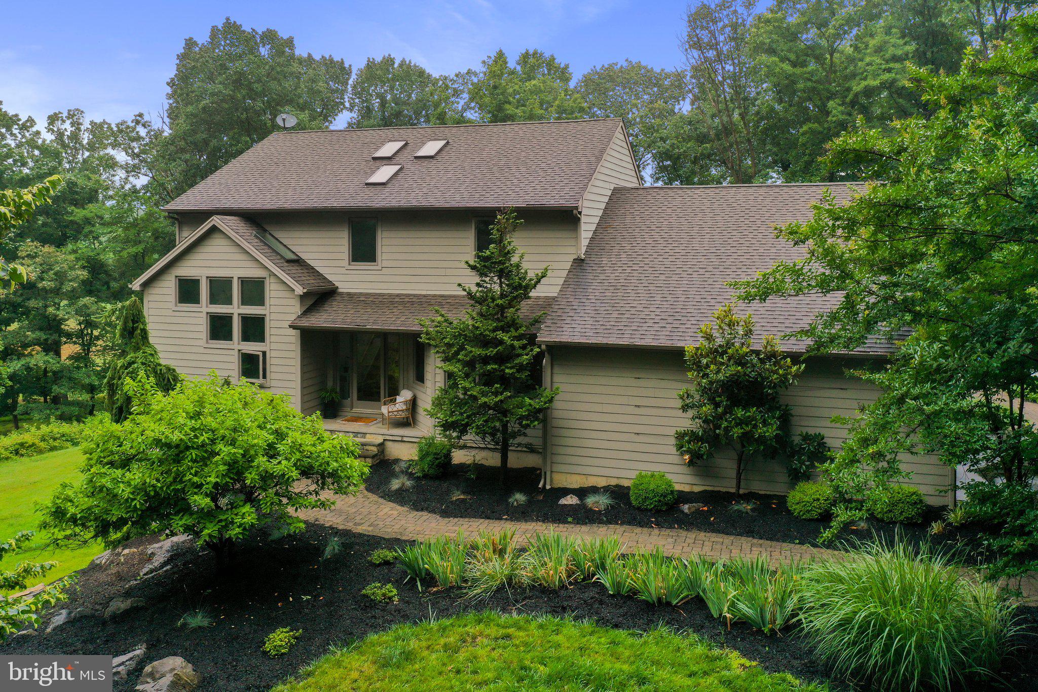 Welcome to this impressive 3700 square feet home that embodies a perfect blend of modern design and impeccable functionality. Nestled within the tranquil and highly regarded MillPoint neighborhood in Martinsburg, this exquisite 3BD residence on 2.2 acres presents a rare and coveted opportunity to own a home in a sought-after neighborhood which emanates tranquility and peace. Tucked away in a quiet enclave, awaits a lifestyle where the distractions of the outside world fade away, allowing you to unwind and recharge in complete harmony.
From the moment you step inside, prepare to be captivated by the seamless open floor plan, thoughtfully designed to maximize both space and comfort. The stylish living area effortlessly merges luxury with practicality, creating a harmonious and inviting space.
Indulge in the sleek and contemporary appeal of the kitchen, featuring stainless steel appliances and a generously sized island that serves as the focal point, blending functionality and style. Effortlessly navigate through this well-appointed space, equipped with top-of-the-line appliances to satisfy even the most discerning chefs. The expansive island not only provides ample countertop space for meal preparation but also comfortably accommodates up to eight people, making it an ideal gathering spot for entertaining guests or enjoying relaxed meals with loved ones.
Every room showcases remarkable fixtures that leave a lasting impression of refined taste and impeccable craftsmanship. From the meticulously placed lighting fixtures to the carefully chosen hardware, each detail has been thoughtfully considered to enhance the overall ambiance and magnetic allure.
Retreat to the serenity of the first master bedroom, where a private deck awaits your moments of peaceful relaxation. The master bath offers an indulgent shower experience, with rainfall-like showerheads that provide a soothing sensation akin to nature's gentle downpour. Step outside onto the deck and immerse yourself in the tranquility of your surroundings, savoring the sights and sounds of the serene setting. Luxuriate in the opulence of the marble baths, meticulously designed to create a spa-like ambiance. Additionally, the presence of a second master en suite makes this home perfect for multi-generational living or accommodating guests in utmost comfort.
Embrace the natural beauty that surrounds you on the two tree-level piano-shaped African Redwood decks, seamlessly integrating the indoor and outdoor spaces. Enhanced with marine cable railings, these decks provide an enchanting vantage point to admire the breathtaking views. Recently added to the property, the new pool features a tanning ledge, inviting you to bask in the warmth of the sun while enjoying the refreshing waters. Whether you seek a leisurely swim or a place to cool off during hot summer days, this pool serves as the perfect oasis while providing recreation.
Schedule your private viewing today and prepare to be captivated by the unmatched beauty and the epitome of refined living that awaits you.