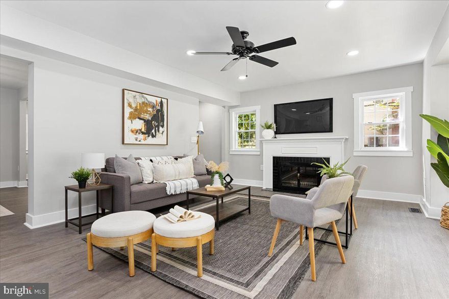 Welcome to this stunningly renovated Cape Cod farmhouse located in Towson, Maryland. With 2500 +/-sq ft of living space, this home boasts 4 bedrooms and 3 full custom tile baths, as well as a detached car port for 2 cars. Step inside and be greeted by luxury vinyl plank flooring throughout the first level, highlighting the wood-burning fireplace and picture window that looks out over the front yard. The interior of this home is a dream, featuring a kitchen with stainless steel appliances, quartz countertops, an island, and tile backsplash. The kitchen dining combo opens up into a spacious living area with exposed wood beams and a dining room combo. Need more space? Check out the fully finished basement. Love the outdoors? You'll fall in love with the huge deck and mature landscaping with private trees. This home is located right next to Loch Raven Watershed, perfect for biking, hiking, fishing, and enjoying nature. Don't miss your chance to own this beautiful modern Cape Cod farmhouse in Towson, Maryland. Call today to schedule a tour.