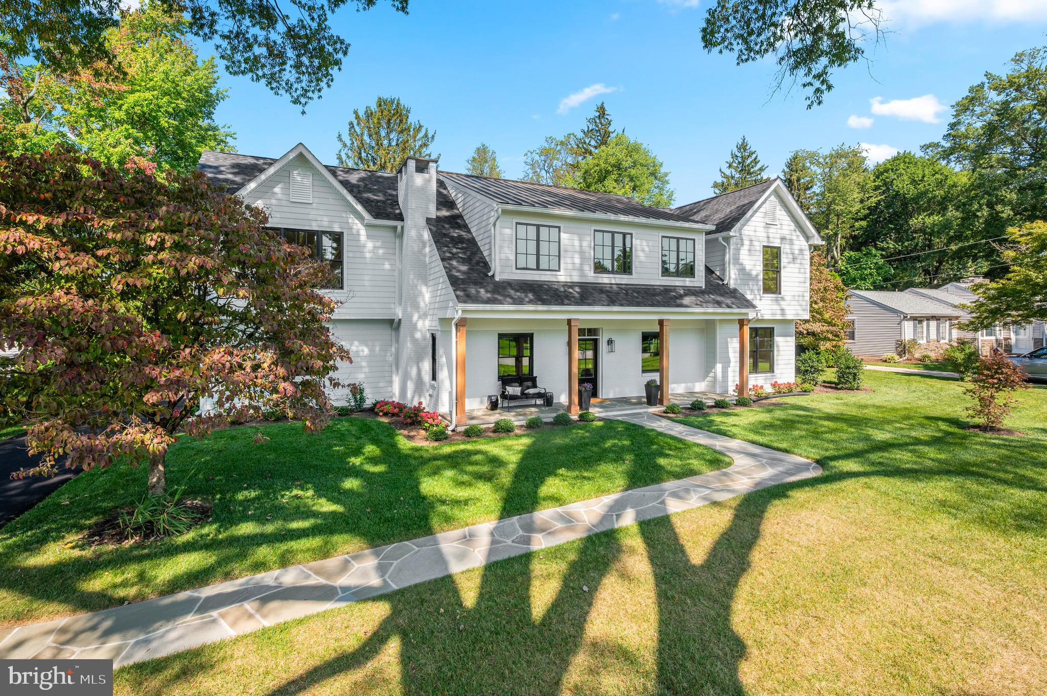 Introducing 427 School Lane, an extraordinary residence in desirable Tredyffrin township, in the heart of the Main Line. Elegant architectural elements and materials combine to create modern luxury. This property boasts 5 bedrooms and 4/1 bathrooms with a detached garage and a flexible bonus space above. The discerning buyer will appreciate the open floor plan creating a light and bright atmosphere perfect for day to day living as well as entertaining. On the first floor, a large gourmet kitchen featuring an induction range, oversized island, custom cabinetry, walk in butler’s pantry and mudroom will help you navigate daily life with ease. The well designed bar and dining room offer up entertaining space along with a private office and a two story great room that brings in light and tranquility. A full en suite bedroom rounds out the first floor offering convenience and accessibility. Upstairs you will find a primary suite with a vaulted ceiling, spa like bathroom and oversized, custom walk in closet. Two bedrooms share a special connected walkway and a bathroom that creates a kindred space. A generous laundry room and additional en suite bedroom complete the second floor. A partially finished basement offers flexibility for entertainment, work out or additional storage space. The oversized, detached two car garage has endless options with a private, conditioned, upstairs bonus space. Water and sewer lines are in place to allow for additional customization. The level lot with mature trees, coupled with a beautiful stone patio, provide a desirable outdoor retreat. A generator offers peace of mind. Take advantage of the award-winning Tredyffrin/Easttown schools, proximity to downtown Wayne, Septa and Amtrak connections, King of Prussia shopping as well as the wonderful dining and recreational opportunities on the Main Line. Don’t miss this house!