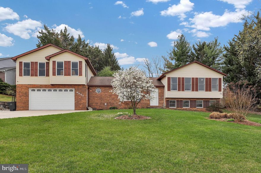Welcome to this impeccably updated 4-bedroom, 3.5-bath split-level home, nestled on a sprawling 0.77-acre lot with breathtaking rural views in the highly sought-after Christy Acres neighborhood of Mt. Airy. Fully renovated with meticulous care, this home boasts an updated roof (2011), updated windows, modern systems, and stainless steel appliances, ensuring peace of mind for years to come.
As you step inside, you’re welcomed by a light-filled, inviting interior that immediately makes you feel at home. The foyer leads into a spacious living room that seamlessly flows into the expansive eat-in kitchen, ideal for both family meals and entertaining guests. The modern kitchen features sleek countertops, stainless steel appliances, and ample cabinet space—perfect for culinary creations. From the kitchen, you'll find the laundry room which provides access to the oversized 2-car garage with shelving. on one side and a large deck that overlooks the stunning backyard on the other.
Designed for comfort and style, the main level includes recessed lighting, providing a warm ambiance as the dining room and kitchen effortlessly connect, making it perfect for hosting gatherings. The grand deck, which spans the length of the kitchen, is an entertainer’s dream, offering the perfect space for alfresco dining or simply relaxing while enjoying the serene views of the expansive backyard.
Upstairs, you'll find the luxurious primary suite, complete with an updated bathroom featuring radiant floor heating along with a towel warmer and a picturesque view through a window—creating a true retreat. This level also offers two additional spacious bedrooms and another beautifully updated full bathroom.
The lower level is a fantastic space for entertaining, featuring a large family room with new flooring and a half bathroom. A huge storage area provides endless possibilities, whether you envision a home office, additional bedroom, or anything you can dream up. Step outside from the walkout family room and enjoy the peaceful outdoor living space.
Adding even more versatility, there’s a charming addition above the garage, perfect for an in-law suite. This space offers a spacious living room, a large bedroom, and a full bathroom—providing privacy and comfort for guests or extended family.
The rear yard is a true retreat, surrounded by lush greenery and offering ample space for relaxation and recreation. Beyond the deck, you’ll find a sizable shed with electricity—ideal for hobbies, storage, or even as a home office. With no homeowners association (HOA), you have the freedom to personalize the property without restrictions.
In addition to all these wonderful features, the home offers a large 2-car garage, a concrete spacious driveway, and a parking pad that accommodates 10+ cars—perfect for hosting gatherings or for those who need plenty of parking.
This picturesque home offers the perfect blend of tranquility and convenience. Whether you're seeking a peaceful family retreat or envisioning future investment opportunities, this stunning property is sure to impress. Located just minutes from downtown Mt. Airy, this home combines comfort, style, and endless potential in one exceptional package. Don’t miss the chance to make this dream home yours!