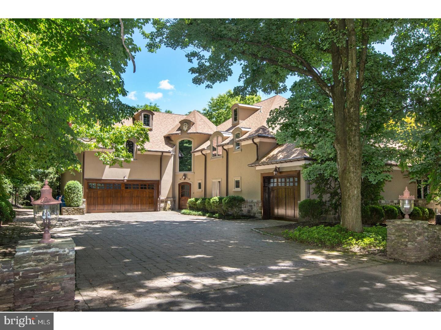 Positioned on one of Solebury's designated "scenic" roads in a private oasis, this architecturally unique home lies on a stunning 3.5 acres. This spectacular house features a one-of-a-kind open floor plan that is suitable for grand entertaining, family gatherings, or quiet nights next to one of the four fireplaces. The soaring ceilings and wall of windows overlook the multi- level blue stone terraces, beautifully landscaped grounds, vine covered gazebo, outdoor kitchen, and an inground pool with a fountain. Seasonal long-distance views coupled with magnificent hardscaping and landscaping make the outdoor areas as inviting as the interiors. An "alley" of bamboo line a gated drive to an outbuilding with multiple uses as well as an outdoor sports court. Minutes from downtown New Hope, 70 minutes to NYC and 55 minutes to Philadelphia make this an ideal location with the benefit of the Award Winning New Hope-Solebury School District.
