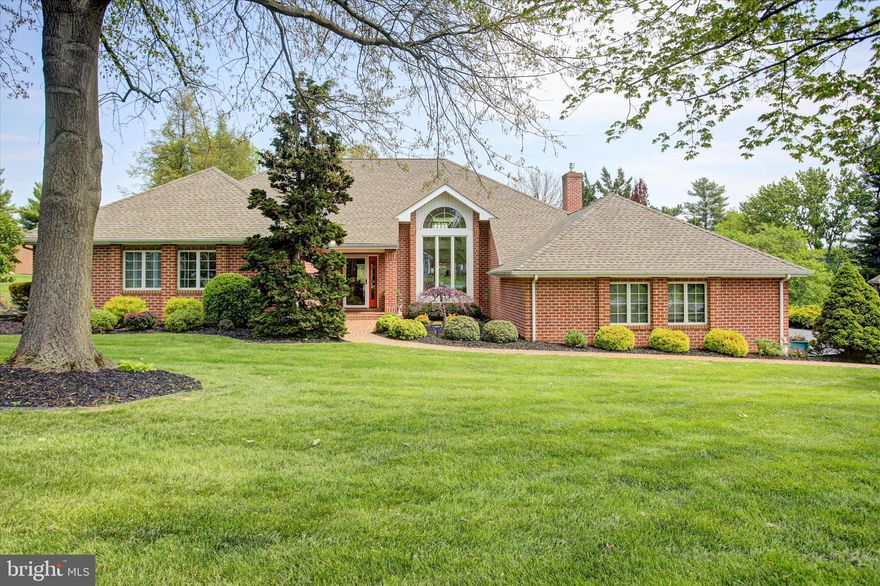Picturesque frontage on the 8th Fairway of the Chambersburg Country Club. This property offers a truly one-of-a-kind setting. Located on a quiet cul-de-sac within the desirable Scott Greene Estates, this all-brick, well-maintained beauty boasts over 4,800 finished square feet of luxurious living space.
The residence has been extensively transformed by a high-end remodel undertaken in 2022-2023. The entire interior received new wood floors, new baseboards, professional painting, and all new LED recessed lighting and electrical fixtures. The heart of the home, the kitchen, was refreshed with painted cabinets, new hinges and hardware, new appliances, stunning quartz countertops, and a custom tile backsplash. Luxury extends to the private spaces: the master bath was completely remodeled to include a custom, handicap-accessible walk-in shower with a glass door, new vanity with quartz countertops, additional custom cabinetry and heated radiant flooring that extends into the walk-in closet. The second bathroom also received a comprehensive makeover, complete with new tub/shower with custom tile, custom cabinetry, vanity, quartz countertops, and radiant heated floor. The mudroom/laundry room and half bath also received a complete remodel, including new flooring, custom cabinetry, vanity and quartz countertops. The unique floorplan is designed for both elegance and natural light, featuring a sprawling main level that includes the primary ensuite and three additional bedrooms all showcasing plantation shutters, a full bath, a living room with flows to a beautiful rear sunroom, spacious foyer, dining room with an incredible front yard view, a convenient sunken family room with gas fireplace and a mud/laundry room that serves the oversized 2-car garage with a 50-amp RV/EV outlet and side entrance.  The enhancements continue with a new front door and sidelights, new storm door, and a custom live-edge mantle added over the family room fireplace. 
The second floor offers a spacious office/flex space with open views to the main floor and walk-in attic storage.  Built-in cabinetry throughout enhances the home's custom appeal.  The full basement presents a quiet rec room getaway to enjoy and plenty of easy access, dry storage. Outside, the property offers a spectacular setting perfect for entertaining and relaxation. The spacious rear patio overlooks a manicured lawn and landscaping, complemented by the addition of a new 12x26 inground heated saltwater pool, landscaped with pavers and surrounded by new black aluminum fencing.
No HOA - public water and sewer - minutes from I-81 and shopping - Sellers have paid for lawn treatment and mowing for the 2026 season. 
This home is not merely a residence; it's a meticulously upgraded sanctuary waiting to host your most cherished memories.