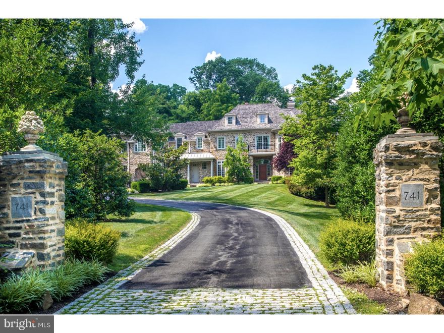 One of Bryn Mawr's finest residences on one its most coveted cul-de-sac streets! An exceptionally grand & elegant property nestled on 1.5 meticulously-manicured acres, presenting a stunning stone European-style main home, separate newly-built high-end guest house atop a heated workshop & 6 -car garage detached 3-car garage. Stone pillars greet your entry to the long Belgian block-lined drive that leads to sheer magnificence. The exquisite main house is amenity rich & generously proportioned with 6 bedrooms & 7.2 baths. The magazine-worthy interior begins with a sophisticated 10' reception hall, introducing the extensive millwork, bespoke finishes & distinctive architectural details throughout. Thoughtfully-designed living spaces graciously accommodate large-scale entertaining & intimate gatherings. A state-of-the-art chef's kitchen open to a breathtaking vaulted breakfast room; coffered family room with fireplace & built-ins facing the awing rear grounds; fireside music room; mahogany library/office & bonus living/entertaining room with private patio afford an incomparable upscale lifestyle. The kitchen is currently under renovations and will feature newly painted white and grey cabinetry, a white brick tile backsplash, white and grey quartz counter tops, and new polished chrome hardware. If you weren t in love already you will be now! The 2nd level is highlighted by the opulent master suite with a fireplace, Juliet balcony overlooking the rear grounds, large sitting room, his & her baths, shared walk-in shower, oversized soaking tub, separate water closets & huge his/her walk-in closets. Five en-suite bedrooms & a multipurpose room also occupy this floor. A 2-room suite & full bath are perched on level 3. Extensive upgrades at considerable expense to the owners include adding a separate drive & finishing the sun-filled full walk-out lower level complete with a professional-grade bar, 4000 bottle wine cellar, commercial-size gym with sound system, recreation/media room, full bath & 2nd family room. An entire home site & garage generator provides automatic backup power.