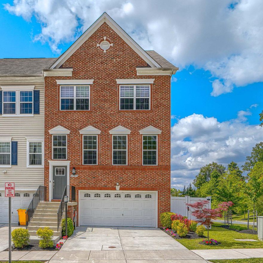 Experience the finest in luxury living in this stunning 4-level brick-front end-of-group townhome located in the highly sought-after community of Gambrills! Proudly owned by only one owner and maintained in immaculate condition, this exceptional 4-bedroom, 3.5-bath home offers elegance, comfort, and modern convenience at every turn. The upper level features a breathtaking owner’s suite with tray ceilings, extensive crown molding, luxury vinyl plank flooring, a walk-in closet, and a spa-inspired bath complete with ceramic tile, double vanities, an oversized shower, and dual shower heads. Two additional great size bedrooms, a full hall bath with double sinks, bedroom-level washer and dryer, oversized linen closet, located on the fourth level you will find a spacious loft/playroom or anything your heart desires. The loft/den opens to a private upper-level deck, creating the perfect indoor-outdoor retreat. The main level showcases an enormous gourmet kitchen with upgraded quartz countertops, tile backsplash, gas stove, oversized island seating, and abundant cabinetry, seamlessly flowing into the expansive family room. Step outside to the composite deck off the main level, ideal for entertaining or relaxing outdoors. Luxury vinyl plank flooring extends throughout the entire home, adding a sleek and modern touch. The fully finished above-grade lower level offers a private bedroom, full bath with shower, tinted windows in bedroom, abundant storage space, and access to the beautifully paved patio area — perfect for guests, extended family, or additional living space. The rear yard is fully fenced with white privacy fencing, providing both beauty and seclusion. Additional highlights include Wi-Fi access points throughout the home, certain rooms have honeycomb shades, recessed lighting, two HVAC systems, a spacious 2 car garage with storage, and the added privacy and natural light that comes with this premium end-unit location. Community amenities include walking/jogging paths, a playground, and a community center. Walking distance near shopping, dining, and major commuter routes, this extraordinary home truly offers the finest in modern living with exceptional indoor and outdoor spaces on every level! This home will NOT last, make your appointment today!