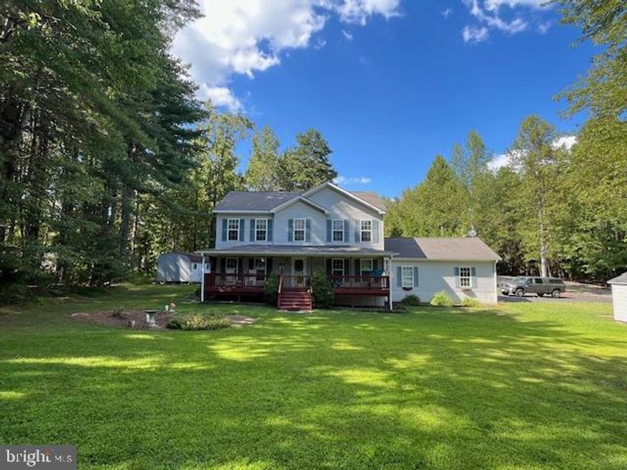 Extremely motivated sellers present a rare opportunity to own on the private side of Lake Anna, one of the nation’s top income-producing lake markets. Located in the quiet, low-traffic community of Jerdone Island, this property offers exceptional flexibility as a  full-time residence, short-term rental investment, or private family retreat.
Situated on a tree-lined 0.73-acre lot, this well-maintained 3-bedroom, 2.5-bath home blends comfort, functionality, and privacy. The updated kitchen features freshly painted cabinetry, new hardware, and a new sink, while refreshed bathrooms provide a clean, modern feel throughout. The primary suite stands out with a double vanity, custom cabinetry, and striking tile work that extends seamlessly from the floor through the walk-in shower and up the walls.
Designed for indoor–outdoor living, the home offers a  large gated front porch and spacious rear deck with an outdoor shower hookup, ideal for entertaining or relaxing after a day on the lake. The fully fenced backyard and mature tree line create a private setting with plenty of room for pets, play, or outdoor gatherings. Two storage sheds add excellent functionality, including one with electricity—perfect for a workshop, hobby space, or additional lake gear storage.
The home is equipped with two HVAC systems, with the upstairs unit newly installed in 2025. The living room includes gas fireplace hookup, allowing for easy future installation if desired. The oversized garage provides ample room for a vehicle, water toys, or storage, along with a durable vinyl-floored entry landing into the home.
Residents enjoy private community lake access with a leased boat slip, just a 5-minute golf cart ride away, making lake days easy and convenient. The neighborhood is known for its privacy, peaceful atmosphere, and minimal traffic. Firefly Broadband is available, supporting remote work, full-time living, or short-term rental guests.
Whether you’re seeking a high-performing lake investment, a weekend escape, or a full-time home, this property delivers privacy, versatility, and prime access to everything Lake Anna has to offer.