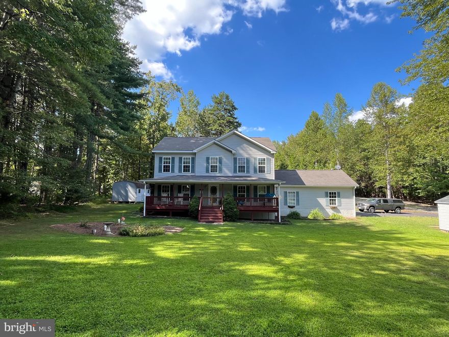 Extremely motivated sellers present a rare opportunity to own on the private side of Lake Anna, one of the nation’s top income-producing lake markets. Located in the quiet, low-traffic community of Jerdone Island, this property offers exceptional flexibility as a  full-time residence, short-term rental investment, or private family retreat.
Situated on a tree-lined 0.73-acre lot, this well-maintained 3-bedroom, 2.5-bath home blends comfort, functionality, and privacy. The updated kitchen features freshly painted cabinetry, new hardware, and a new sink, while refreshed bathrooms provide a clean, modern feel throughout. The primary suite stands out with a double vanity, custom cabinetry, and striking tile work that extends seamlessly from the floor through the walk-in shower and up the walls.
Designed for indoor–outdoor living, the home offers a  large gated front porch and spacious rear deck with an outdoor shower hookup, ideal for entertaining or relaxing after a day on the lake. The fully fenced backyard and mature tree line create a private setting with plenty of room for pets, play, or outdoor gatherings. Two storage sheds add excellent functionality, including one with electricity—perfect for a workshop, hobby space, or additional lake gear storage.
The home is equipped with two HVAC systems, with the upstairs unit newly installed in 2025. Brand new 2026 water heater and washing machine. The living room includes gas fireplace hookup, allowing for easy future installation if desired. The oversized garage provides ample room for a vehicle, water toys, or storage, along with a durable vinyl-floored entry landing into the home.
Residents enjoy private community lake access with a leased boat slip, just a 5-minute golf cart ride away, making lake days easy and convenient. The neighborhood is known for its privacy, peaceful atmosphere, and minimal traffic. Firefly Broadband is available, supporting remote work, full-time living, or short-term rental guests.
Whether you’re seeking a high-performing lake investment, a weekend escape, or a full-time home, this property delivers privacy, versatility, and prime access to everything Lake Anna has to offer.